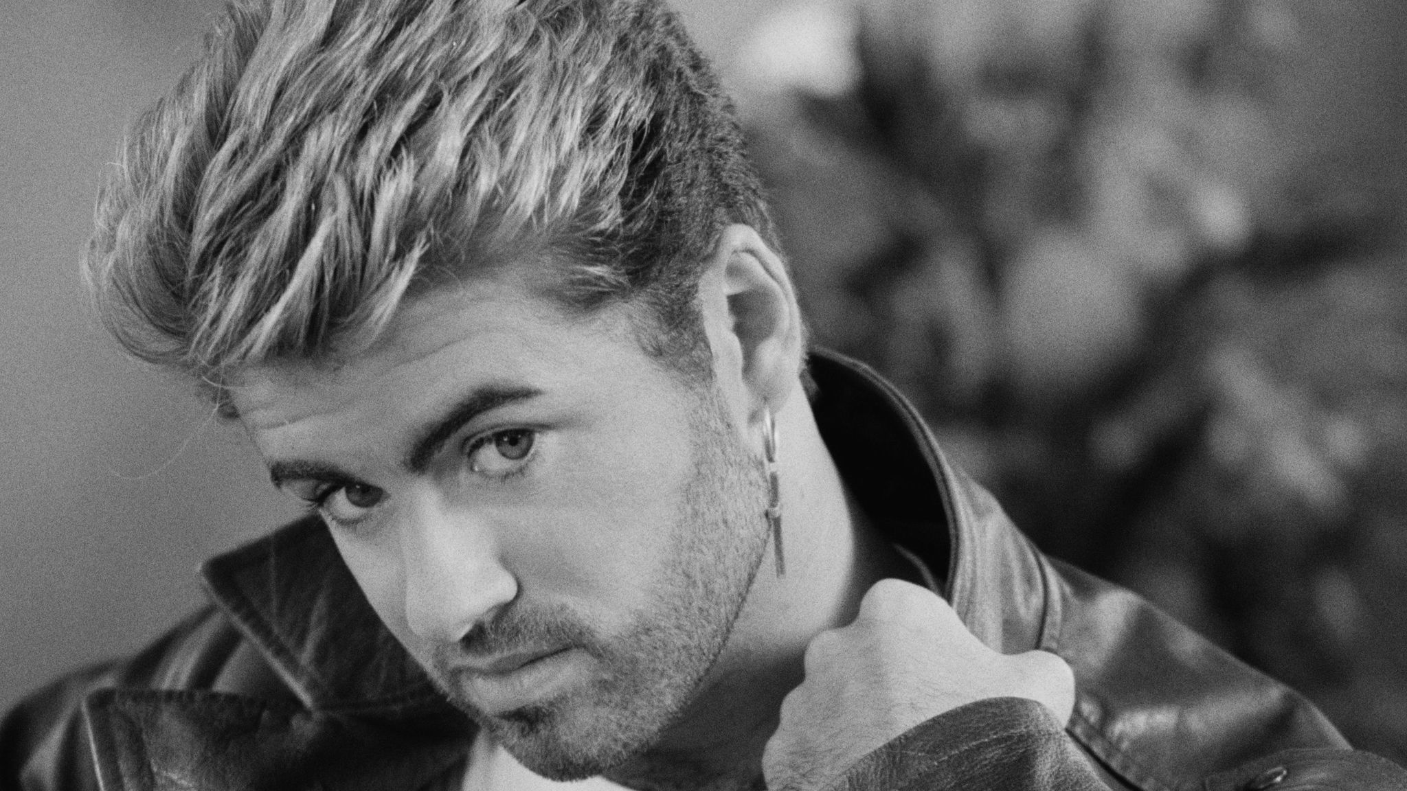 George Michael: A brilliant performer, activist, philanthropist, and champion for artist authenticity. 2050x1160 HD Wallpaper.