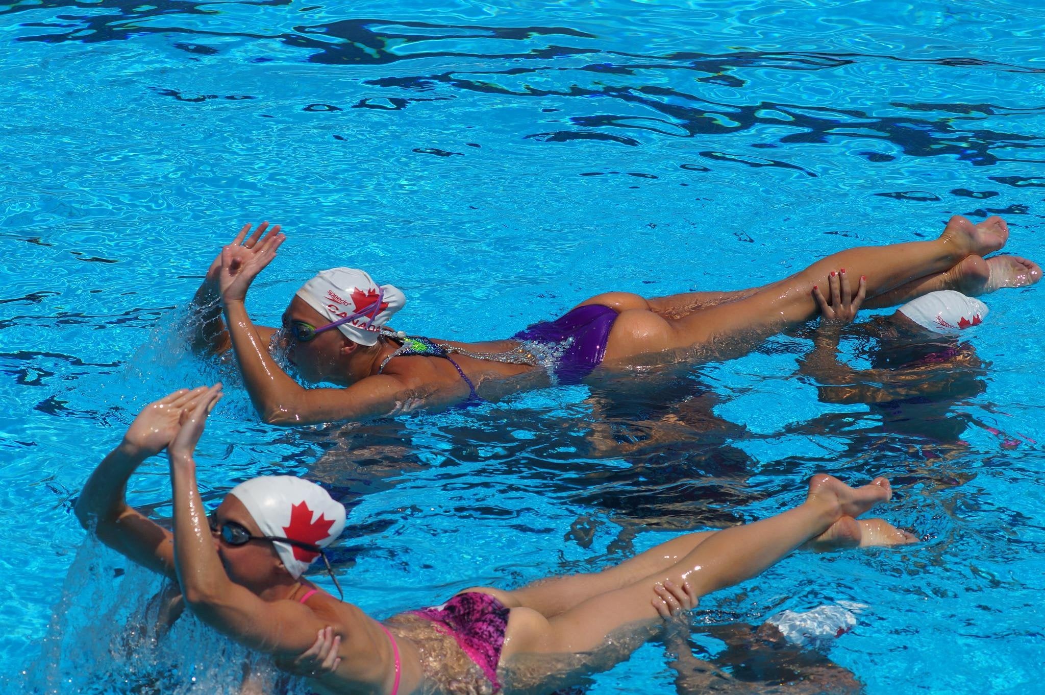 Synchronized Swimming: A training session performed by the Canada national team. 2050x1370 HD Background.
