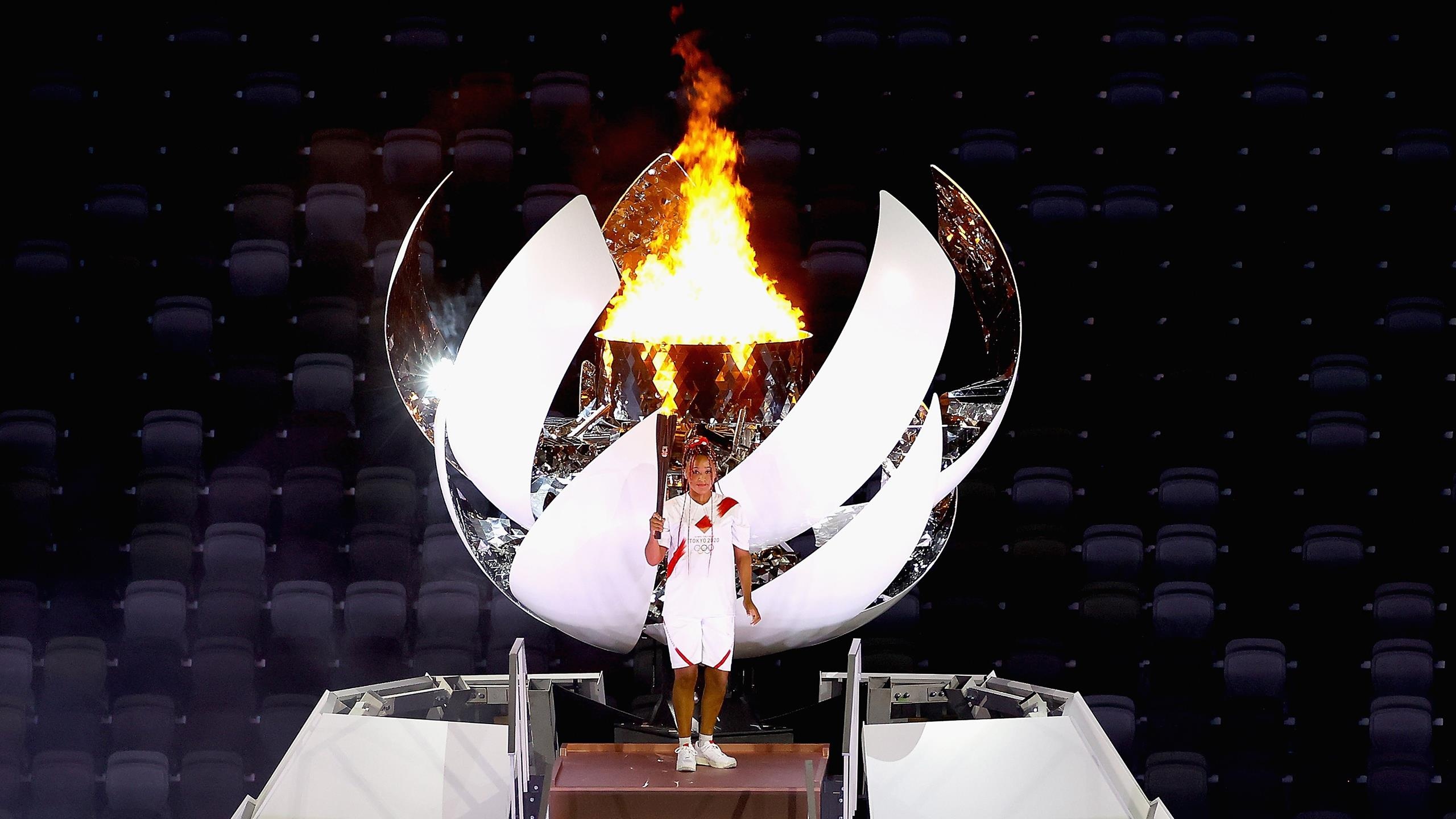Olympic Flame: Tokyo 2020, Naomi Osaka, Olympic cauldron, Opening Ceremony, Torch Bearer. 2560x1440 HD Background.