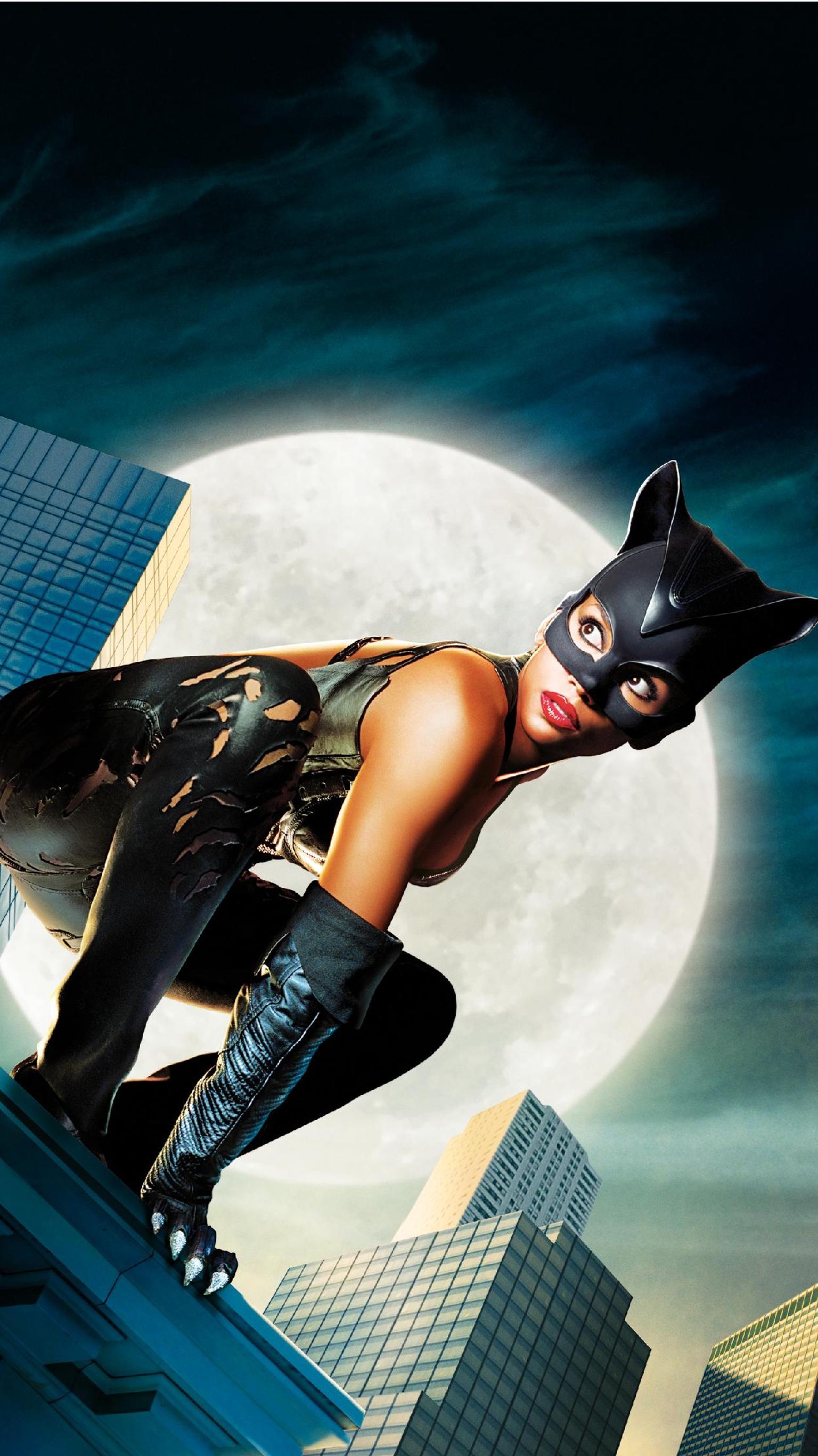 Halle Berry: Catwoman, the alter ego of Selina Kyle, a Gotham City burglar. 1540x2740 HD Wallpaper.