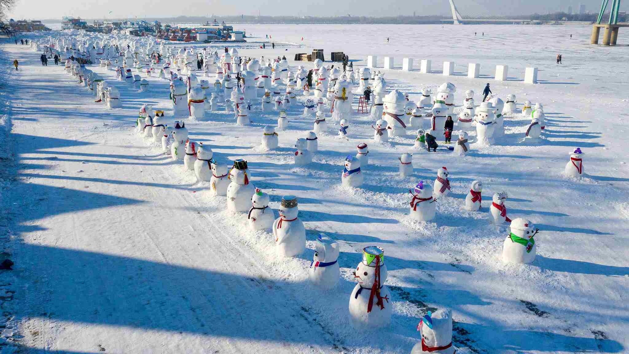 Snowmen in Harbin, Festive celebration, Winter, Tradition, 2050x1160 HD Desktop