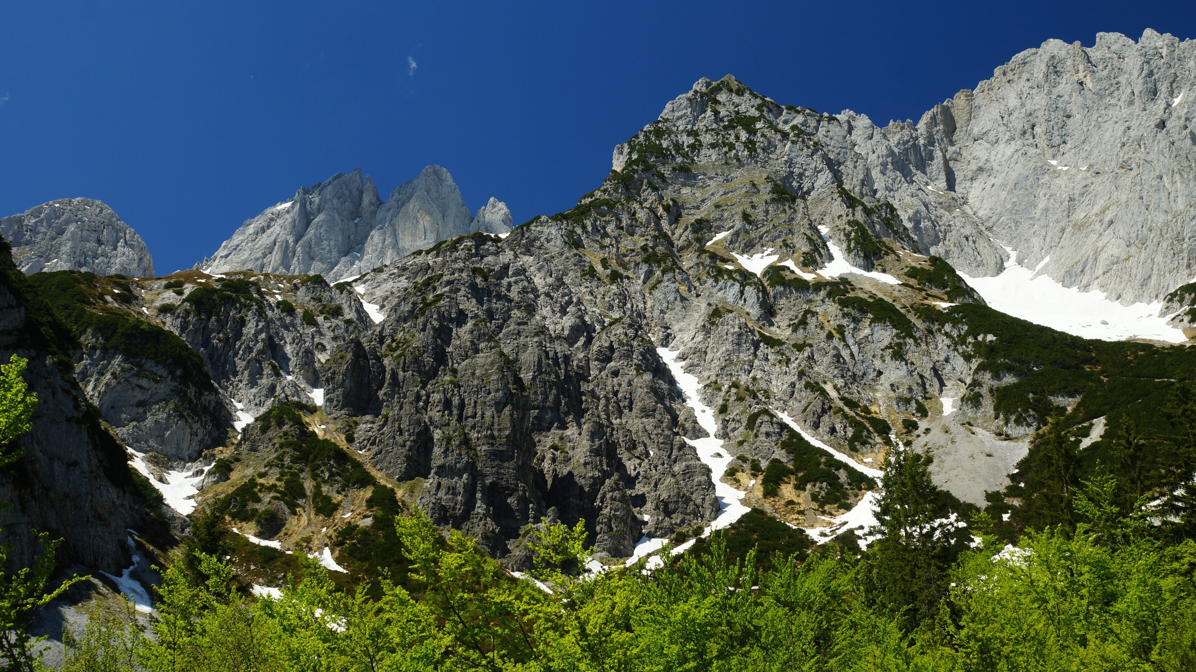 Geology: Alpine, High mountains, Steep cliff with a lot of rough rocks. 3840x2160 4K Background.
