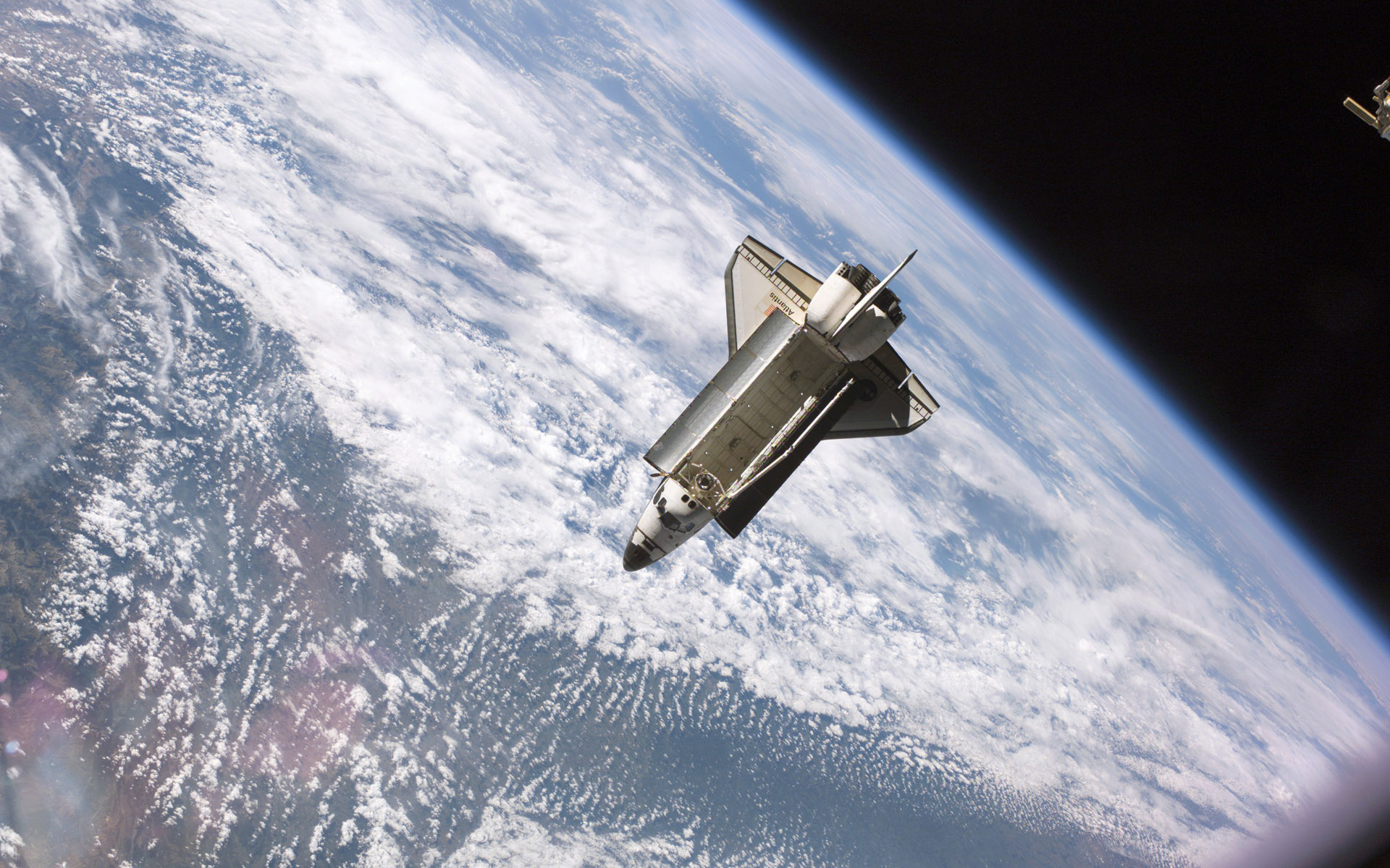 Spacecraft: NASA, A type of artificial satellite, Shuttle, Earth. 1920x1200 HD Wallpaper.