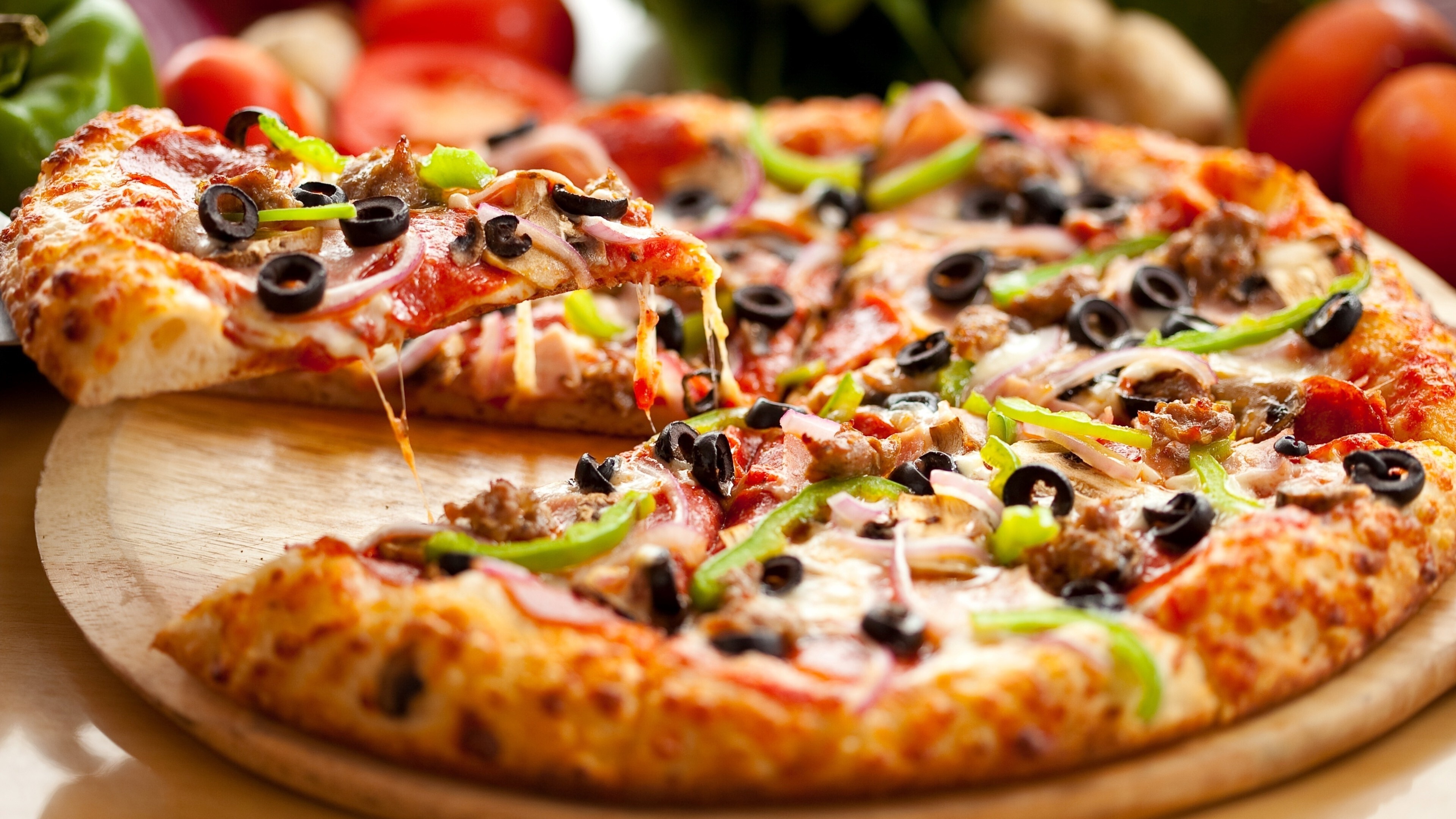 Pizza: A shallow breadlike crust covered with toppings, Cheese, Vegetables, Olives. 3840x2160 4K Wallpaper.