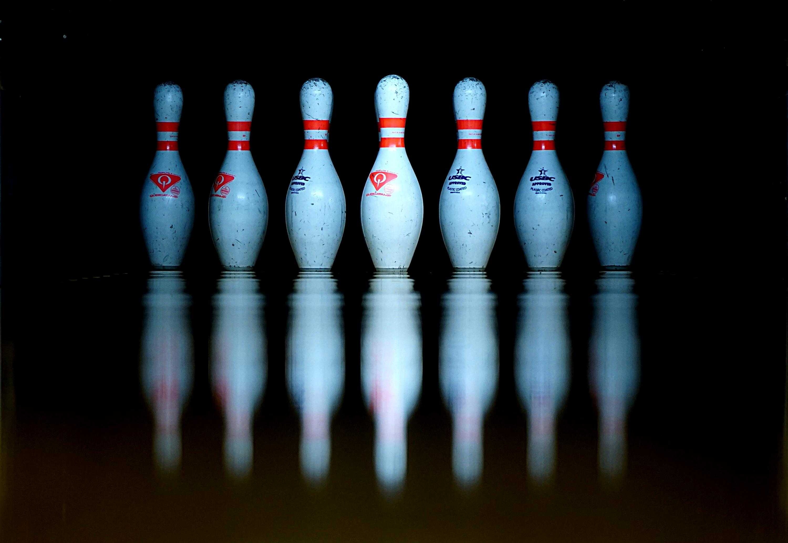 Bowling: The pastime in which a heavy ball is rolled down towards a group of wooden pins. 3000x2070 HD Wallpaper.