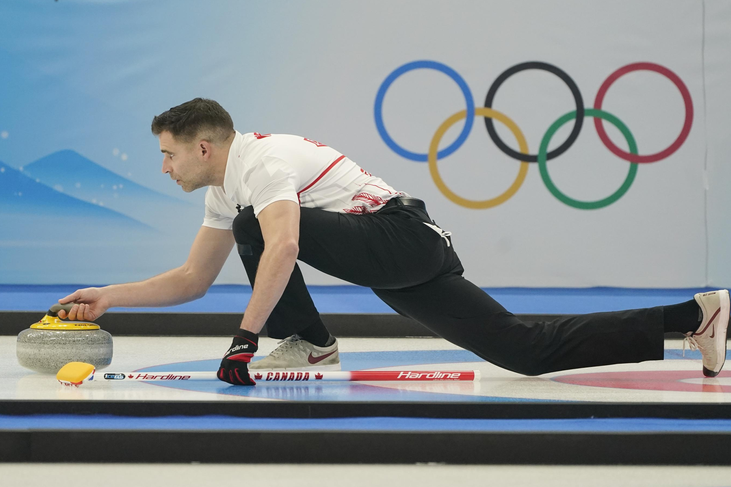 Curling: John Morris of Team Canada competes against Team Norway at the 2022 Winter Olympics. 3000x2000 HD Background.