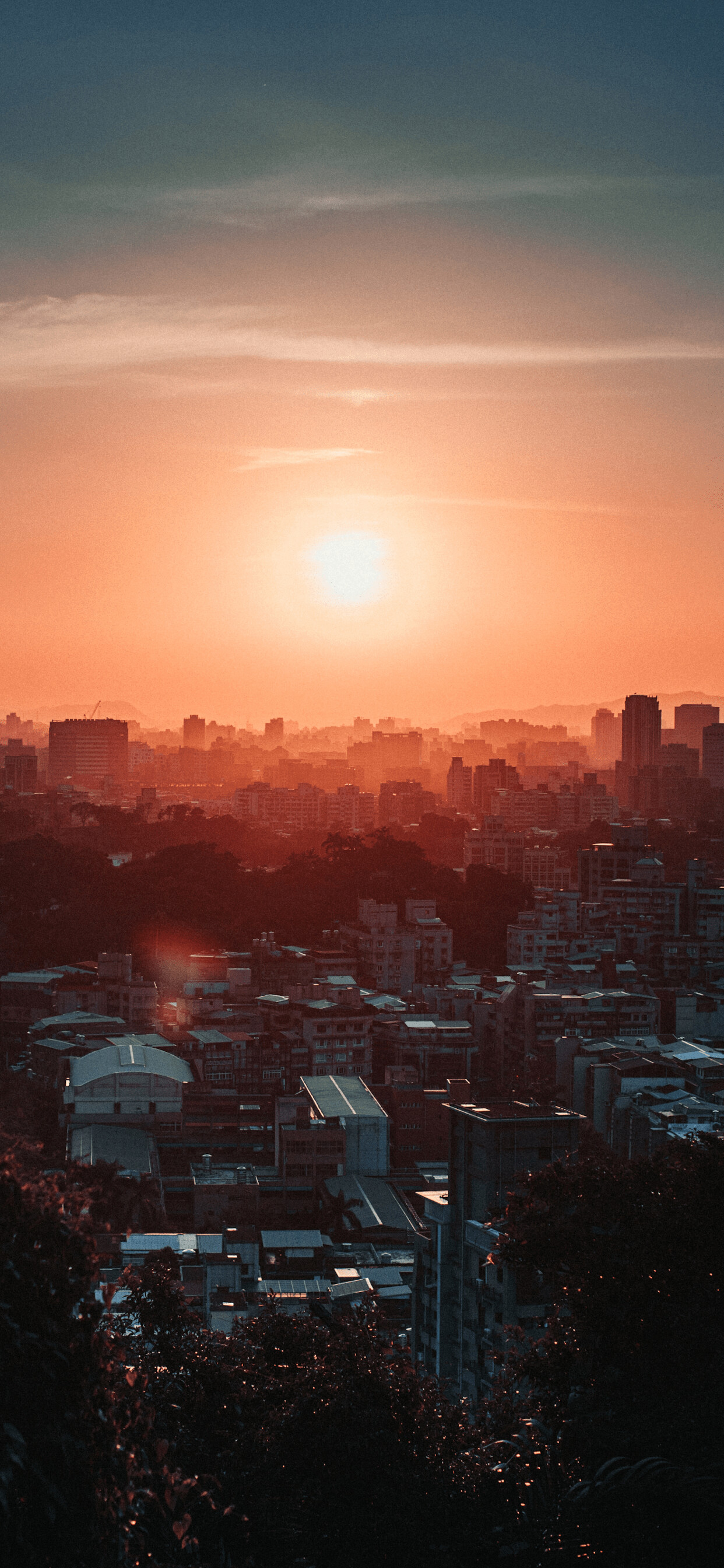 Sunset: Close of day, Cityscape, Orange rays of the sun. 1250x2690 HD Background.