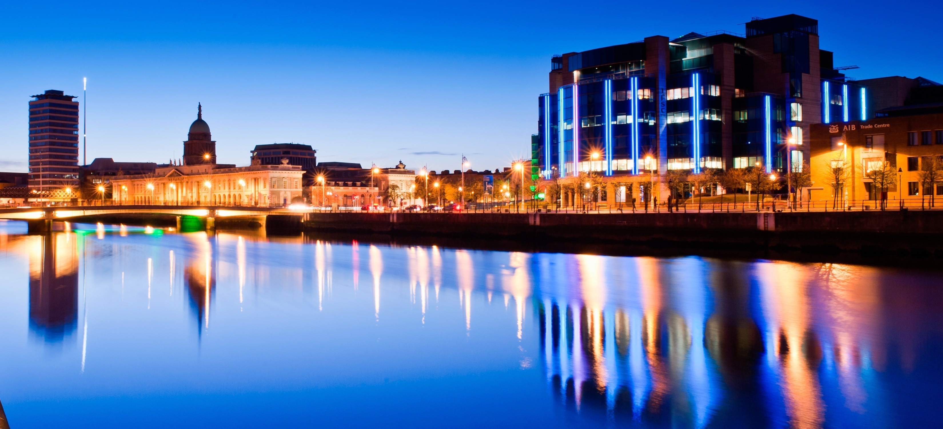 Dublin: The Custom House, Located on the north bank of the River Liffey, Cityscape, Sunset. 3300x1510 Dual Screen Wallpaper.