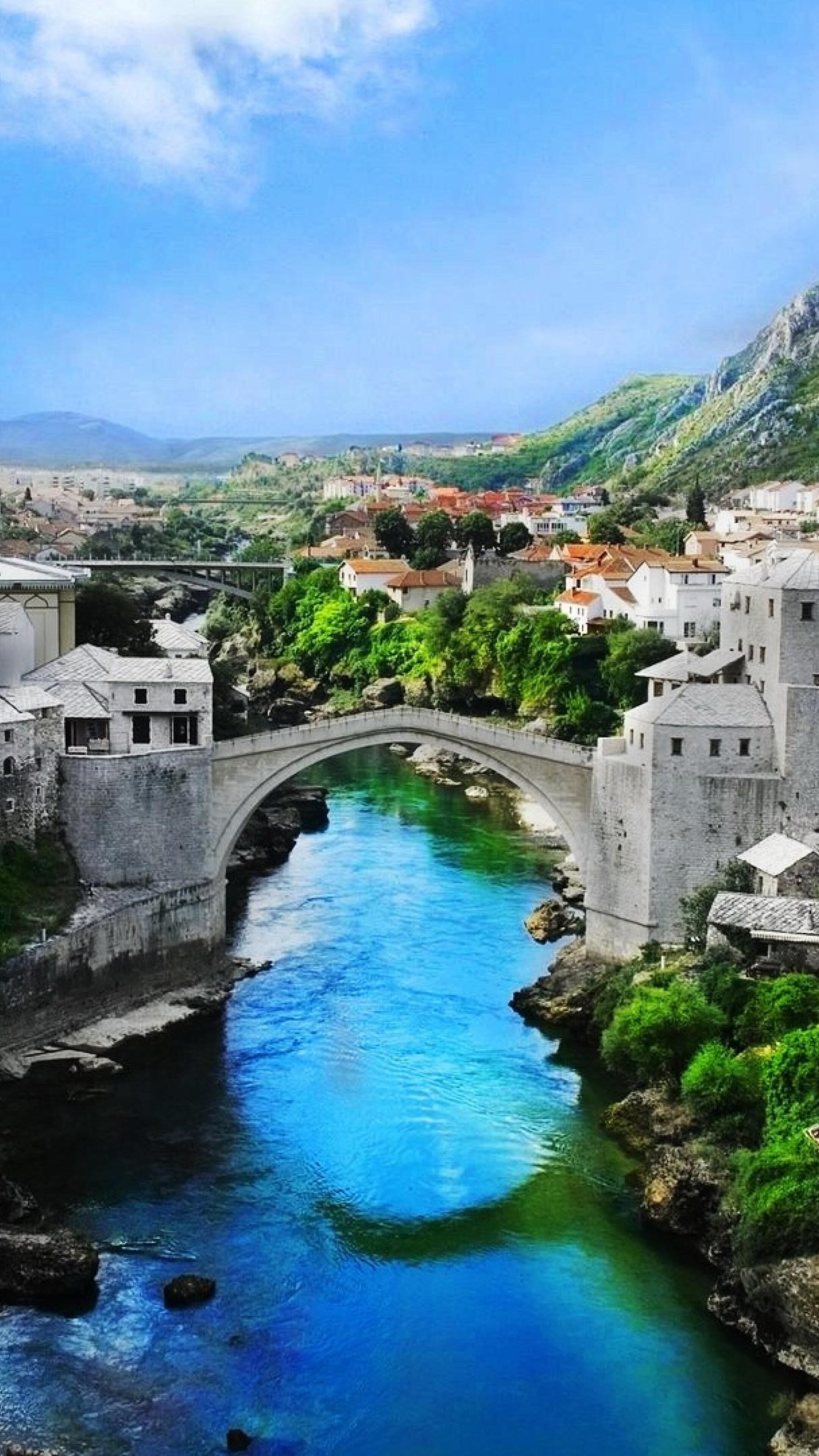 Bridge: Stari Most, A rebuilt 16th-century Ottoman span in the city of Mostar in Bosnia and Herzegovina. 2160x3840 4K Wallpaper.