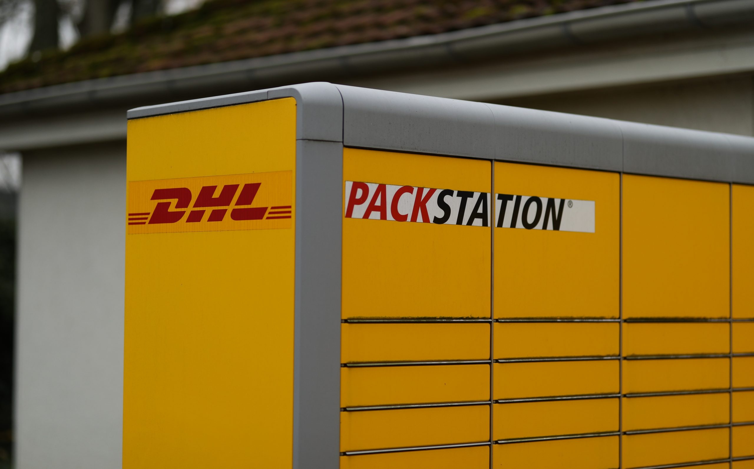 DHL: Packstation, A service of parcel lockers run by a business unit of Deutsche Post's Mail division. 2560x1600 HD Wallpaper.