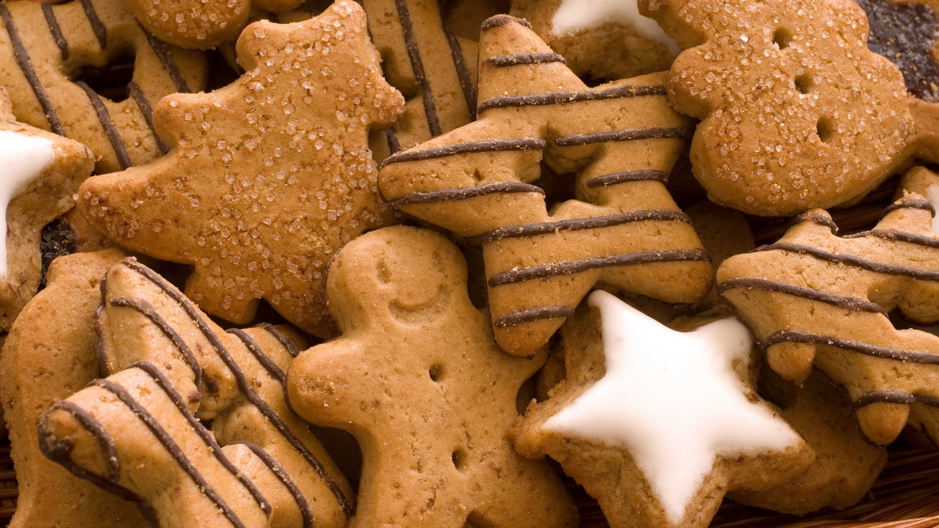 Cookie: Dough is shaped into various designs, such as hearts, stars, and trees. 1920x1080 Full HD Background.