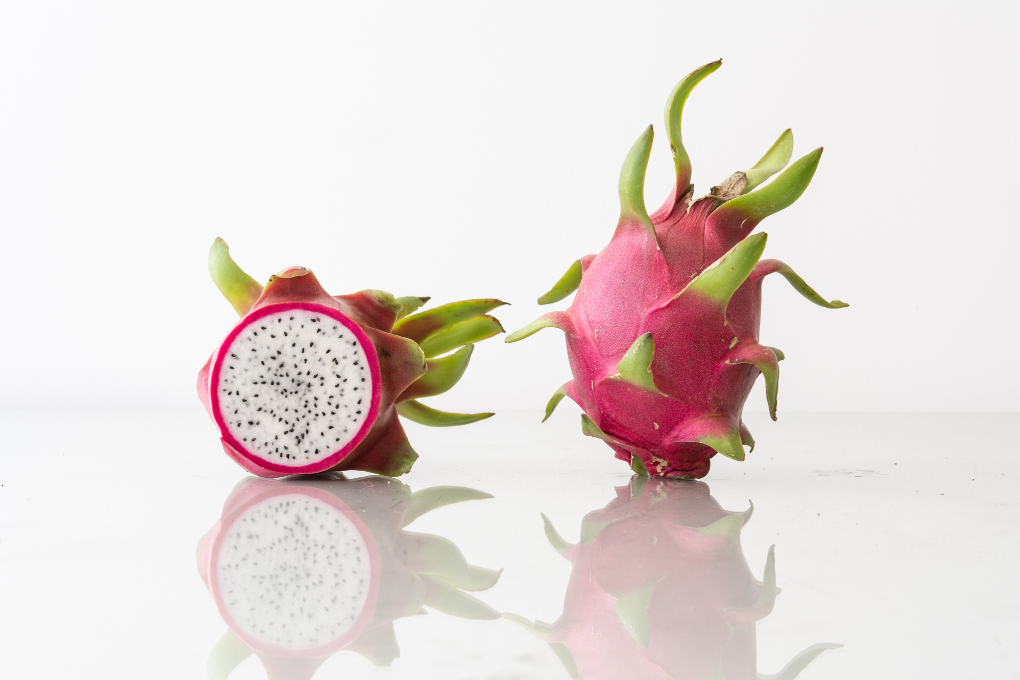 Dragon Fruit: Known for its dramatic appearance, with bright red, purple or yellow-skinned varieties and prominent scales. 2050x1370 HD Wallpaper.