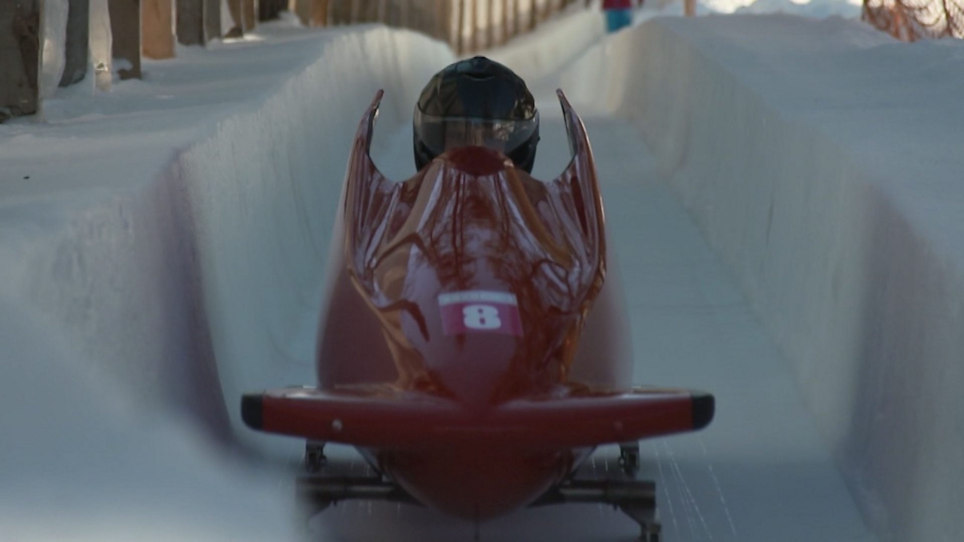 Bobsleigh: A one-man bobsled, An aerodynamic composite-bodied vehicle for one person instead of a team. 1920x1080 Full HD Background.