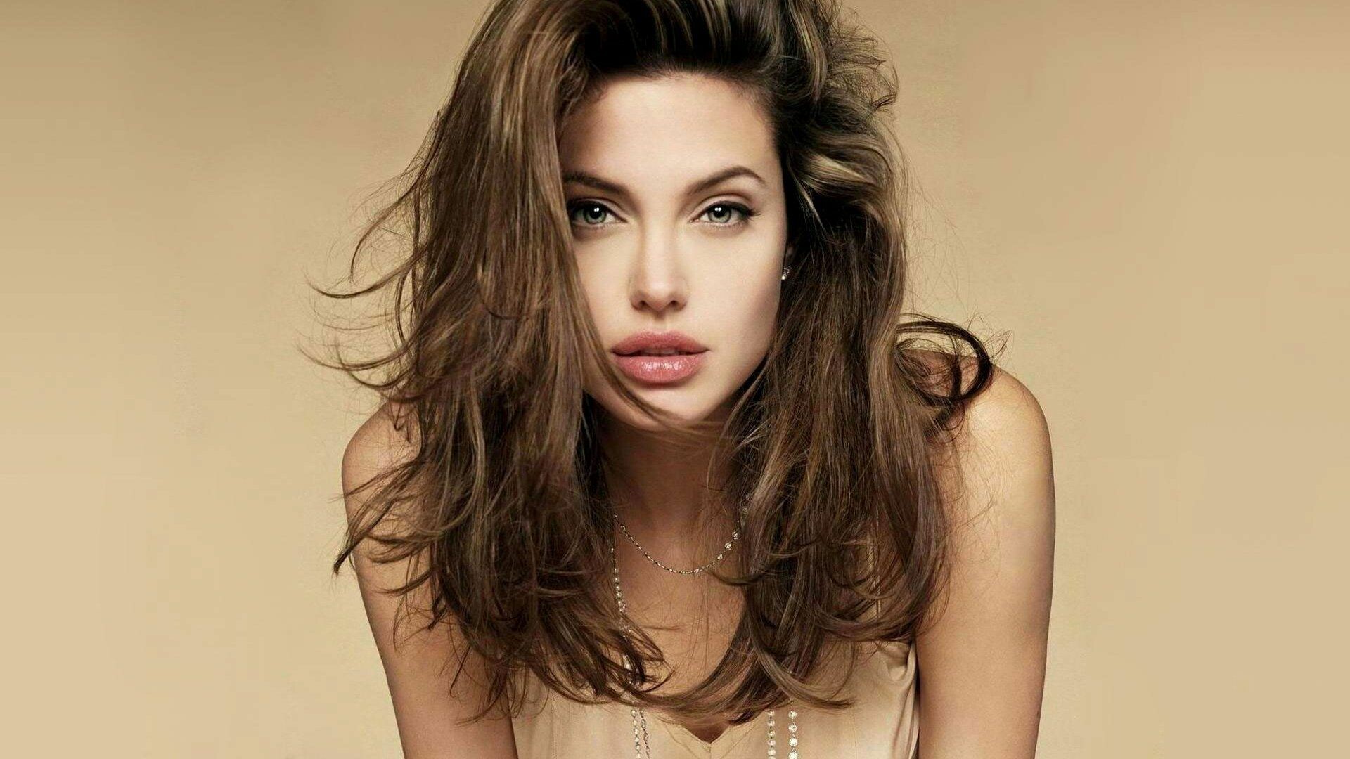 Angelina Jolie: The world's second-highest-paid actress. 1920x1080 Full HD Wallpaper.