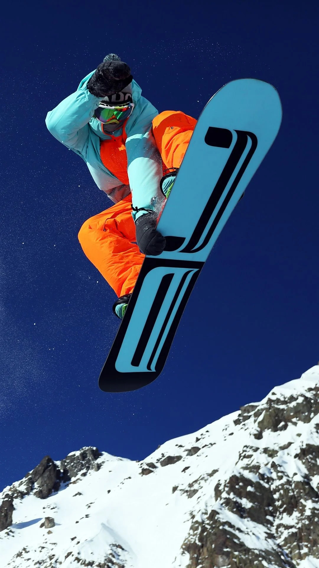 Snowboarding: Travis Rice, John Jackson, Red Bull Aerial Tricks and Big Air performance. 1080x1920 Full HD Wallpaper.