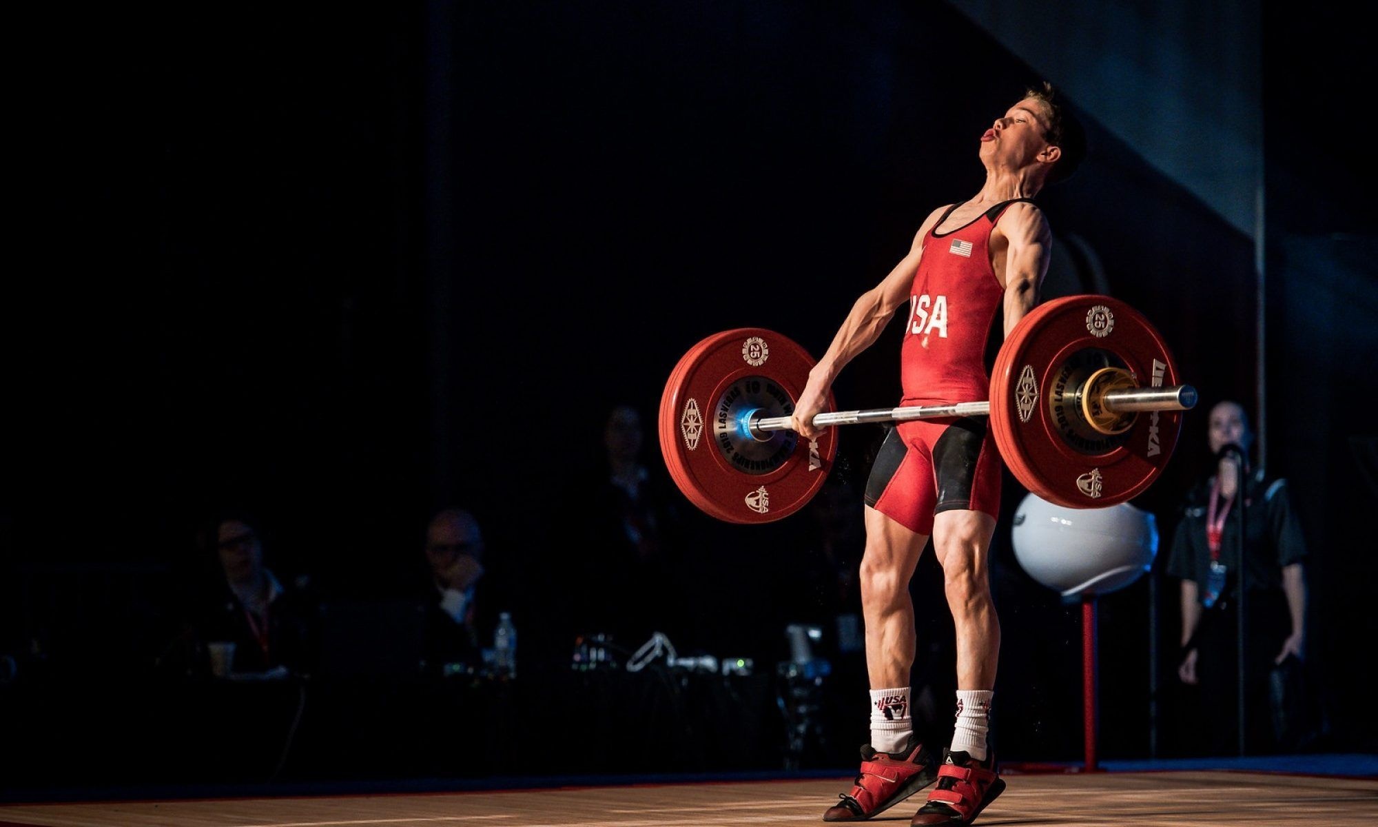 Weightlifting: The clean and jerk, An Olympic sport, International Weightlifting Federation. 2000x1200 HD Background.