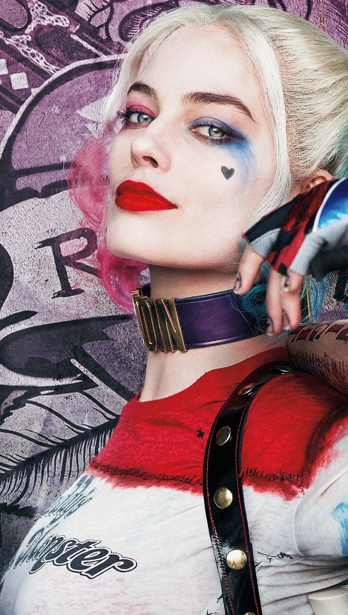 Suicide Squad: Harley's character arc in the films sees her go from being defined by her abusive relationship with Joker to becoming more independent and willing to help society, despite her malevolent tendencies and chaotic, unpredictable personality. 1130x2000 HD Background.