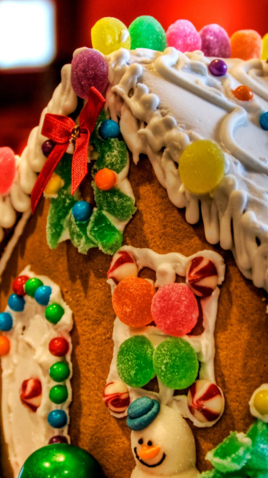 Gingerbread House: Cookie construction, Jelly beans, gumdrops, M&Ms, Hand-decorated sugar cookies. 1080x1920 Full HD Background.