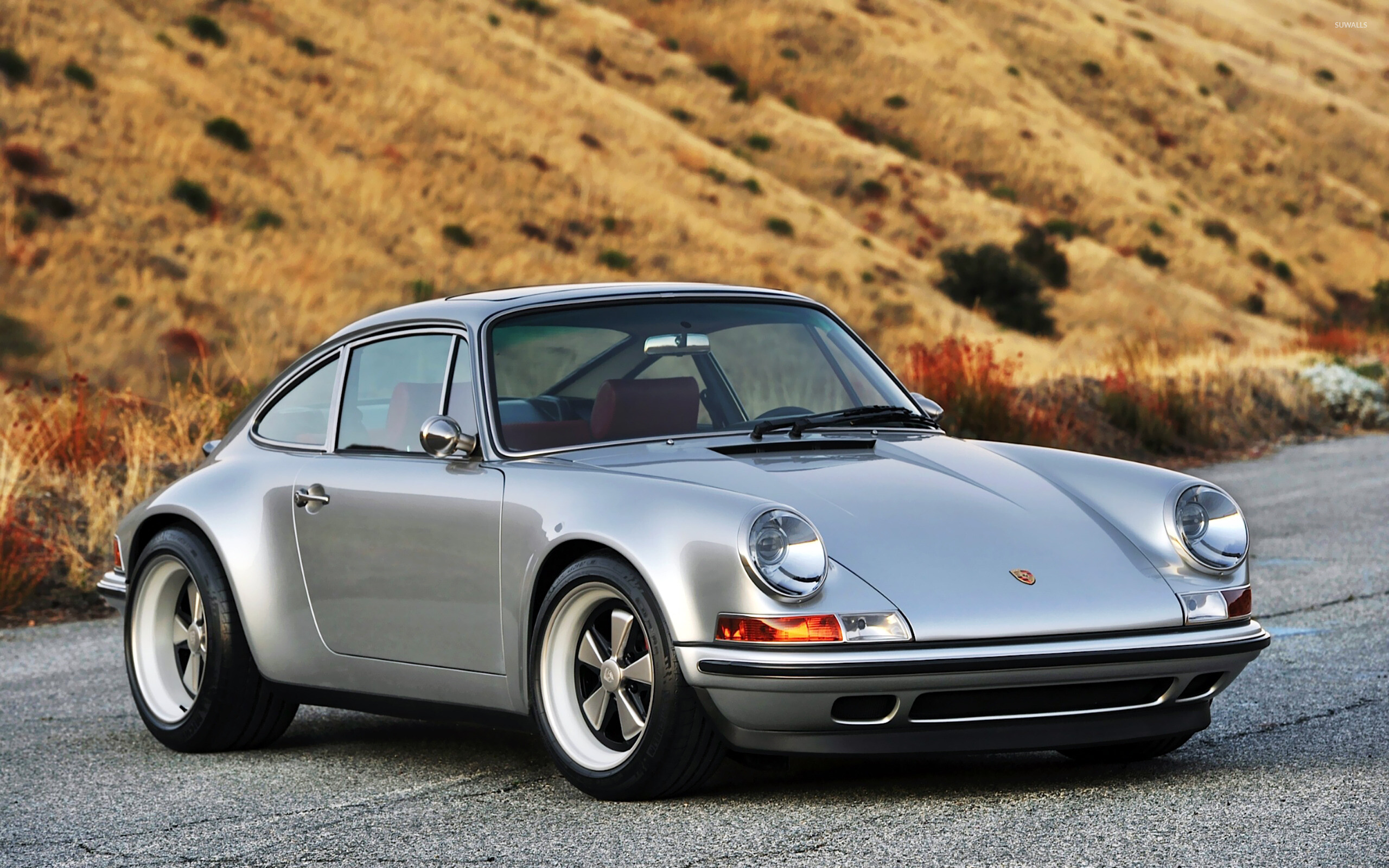 Porsche 911: The 1976 Carrera 2.7 MFI Sondermodells were the last mechanically fuel injected models produced. 2560x1600 HD Background.