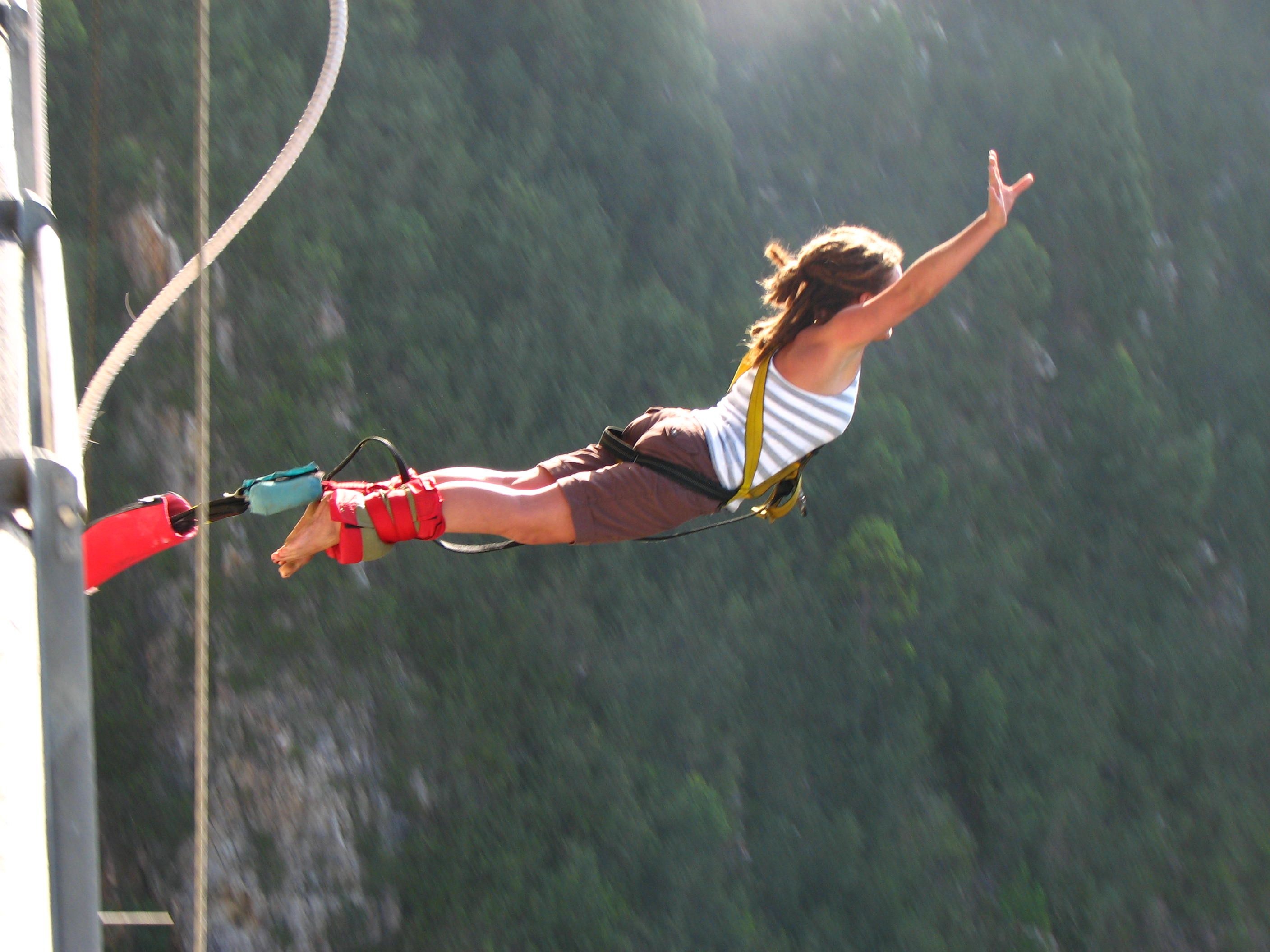 Bungee Jumping: A female adrenaline lover, Extreme adventurous sport, Land-diving, Elastic rope. 2820x2120 HD Background.