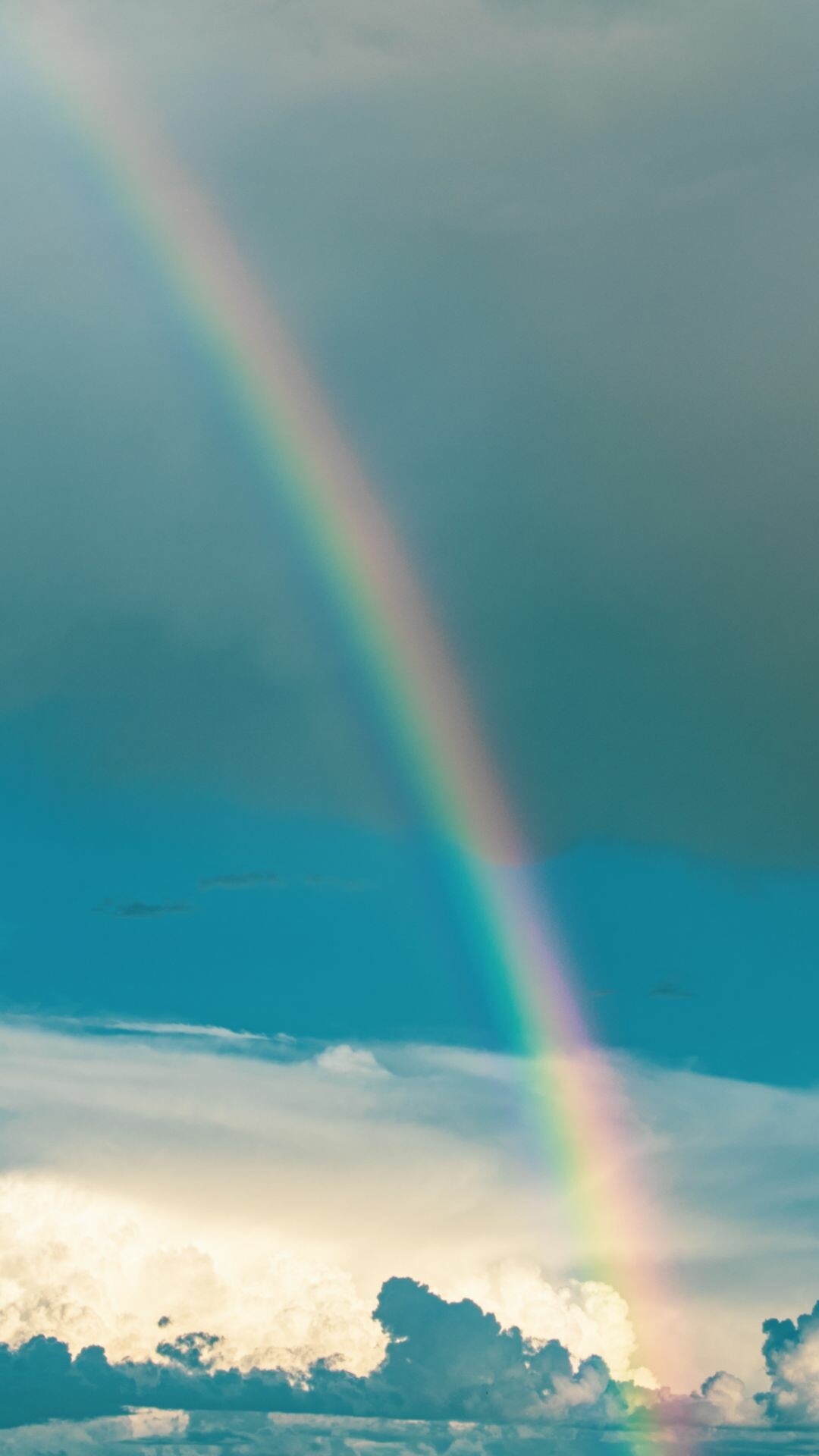 Rainbow Colors: Caused by reflection, refraction, and dispersion of light. 1080x1920 Full HD Background.