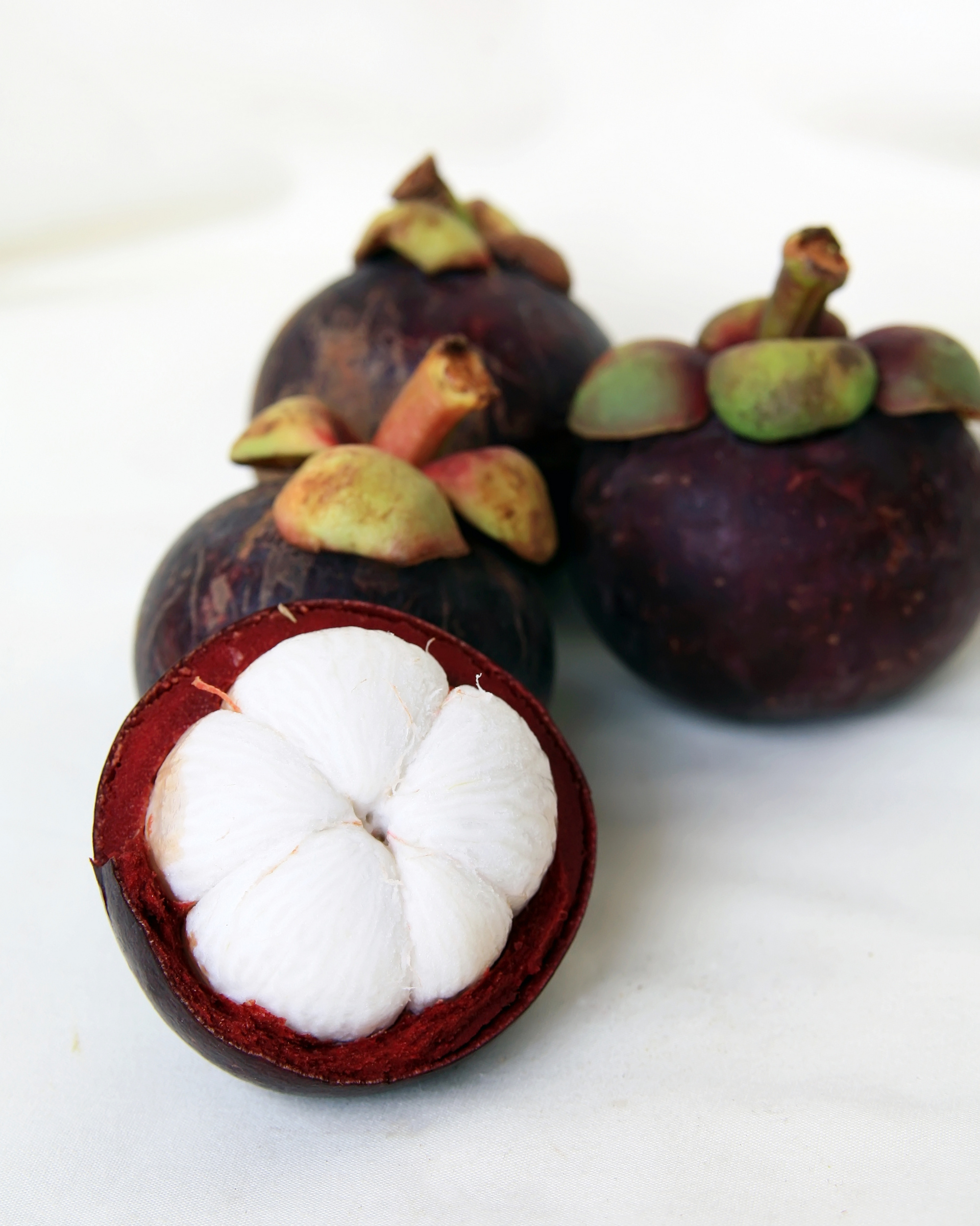 Mangosteen: Native to tropical lands surrounding the Indian Ocean. 2000x2500 HD Background.