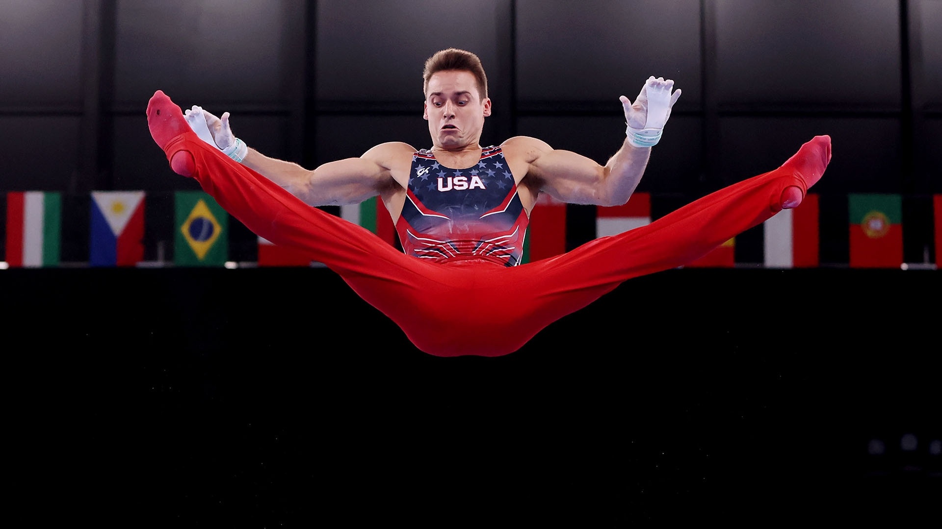 Floor (Gymnastics): Sam Mikulak, A six-time US national all-around champion, A three-time Olympian. 1920x1080 Full HD Background.