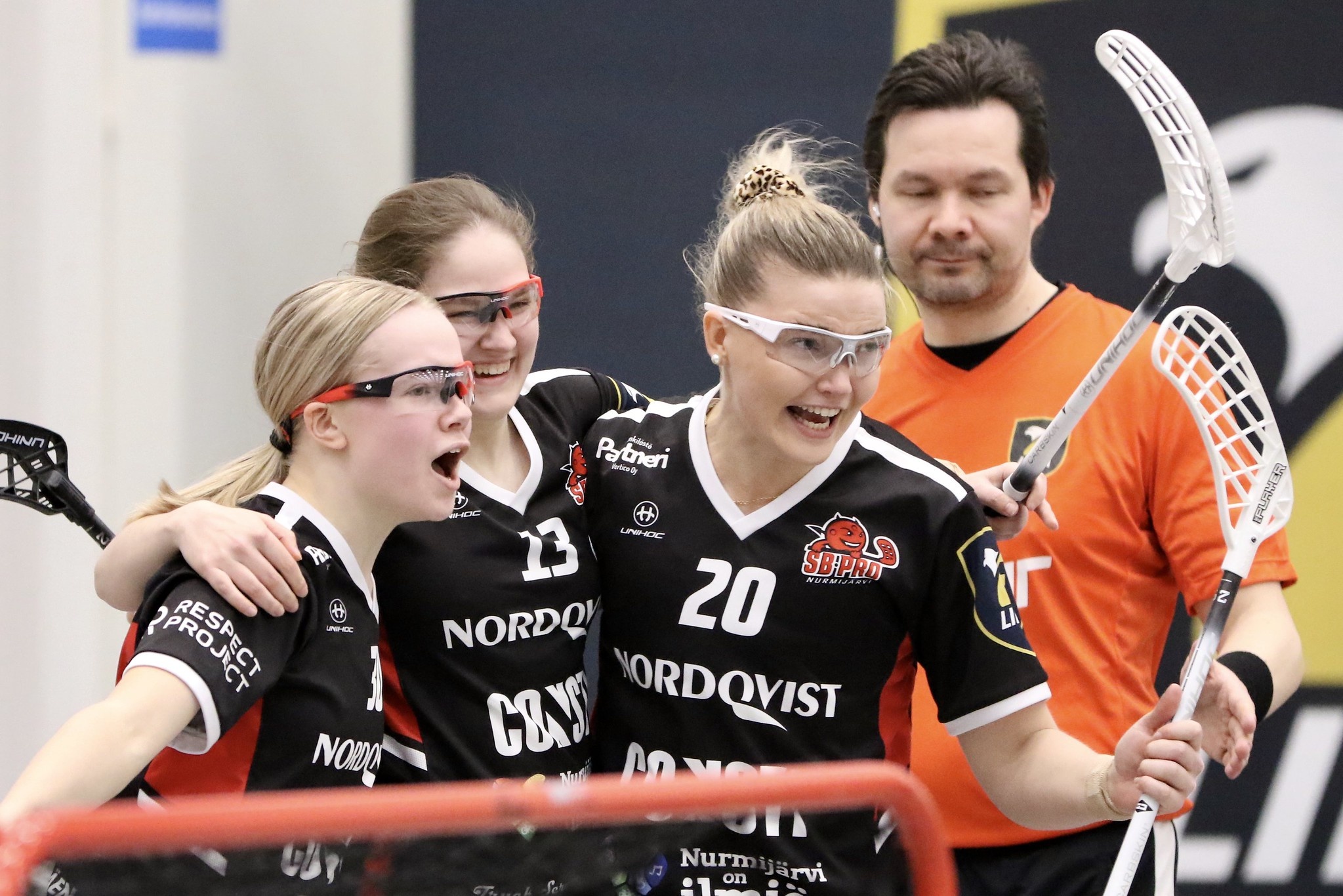 Floorball: Professional women's team players, An indoor sports discipline for both men and women. 2050x1370 HD Background.