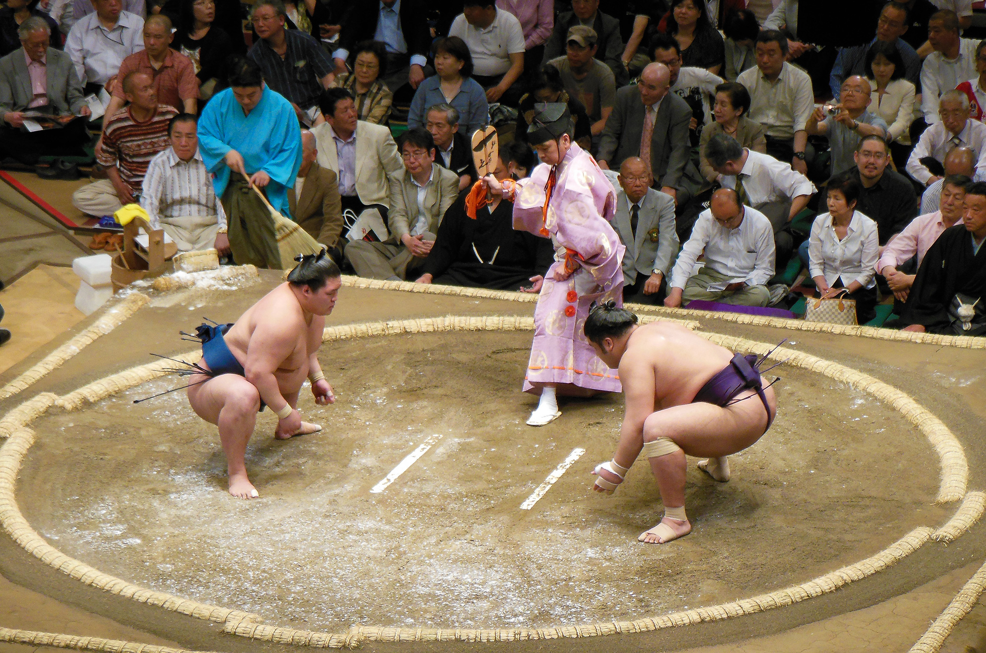 Sumo: A form of competitive full-contact wrestling originated in Japan, Combat sports. 2000x1330 HD Background.