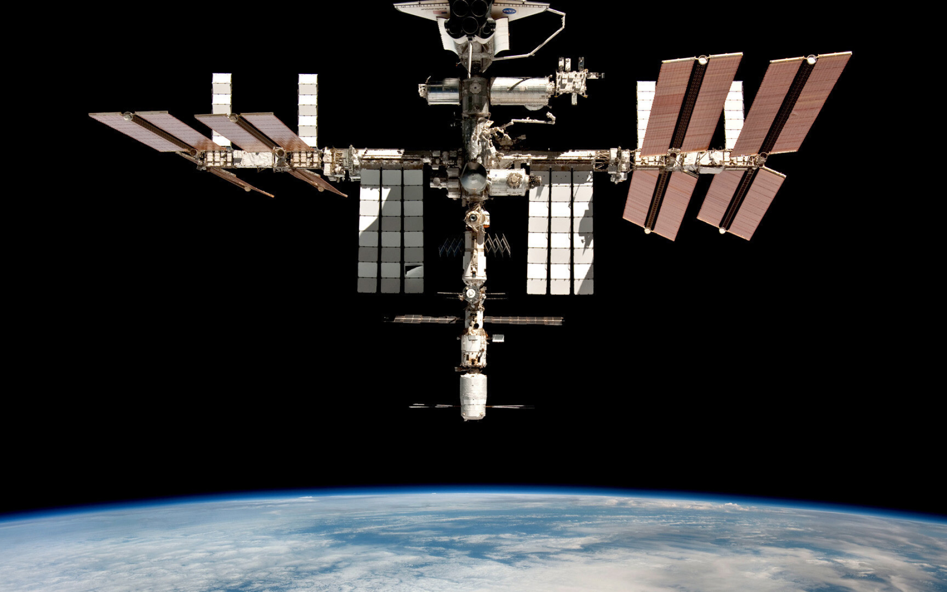 International Space Station: A permanently crewed Earth-orbiting spaceship, Earth. 1920x1200 HD Wallpaper.