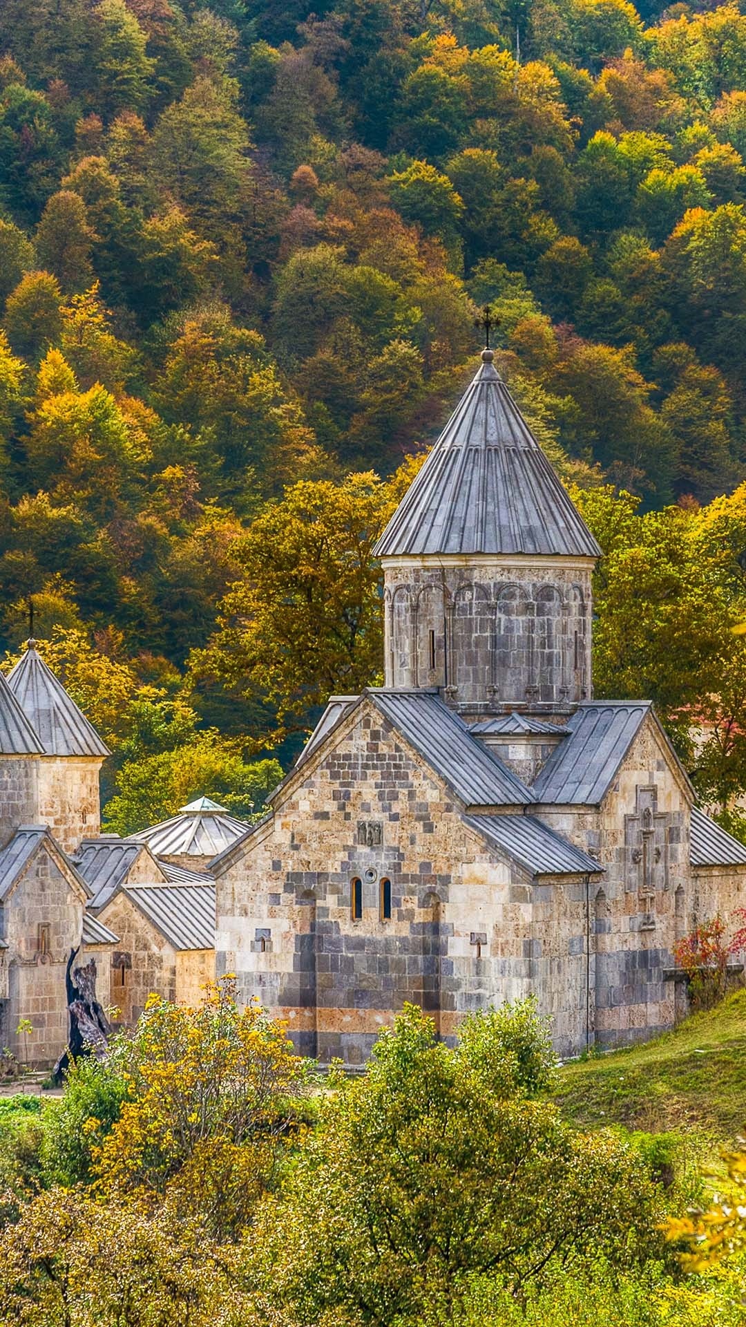 Armenia: Haghartsin Monastery, A colorful autumn forest, Teghut, Tavush Province. 1080x1920 Full HD Background.