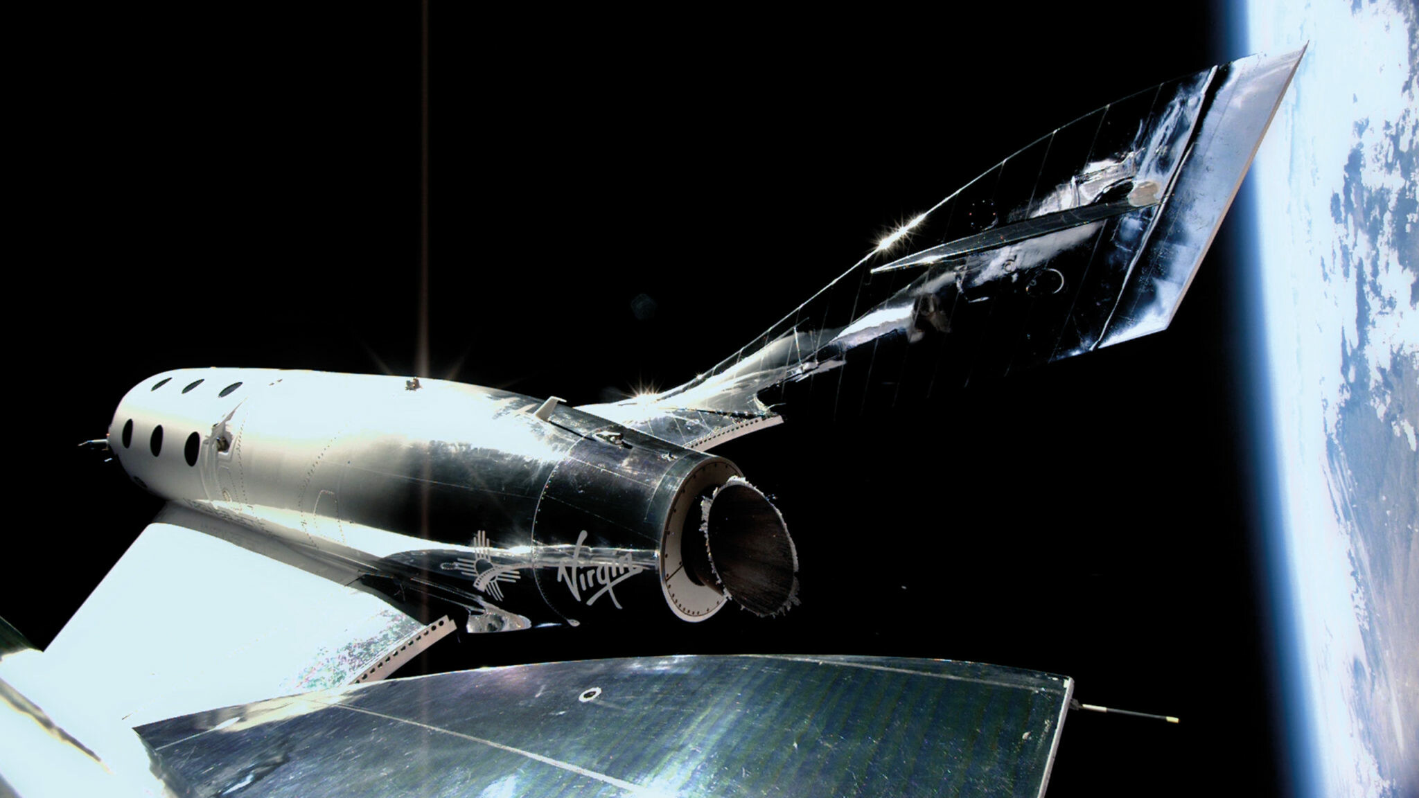 Virgin Galactic: An aerospace and space travel company, pioneering human spaceflight for private individuals. 2050x1160 HD Background.