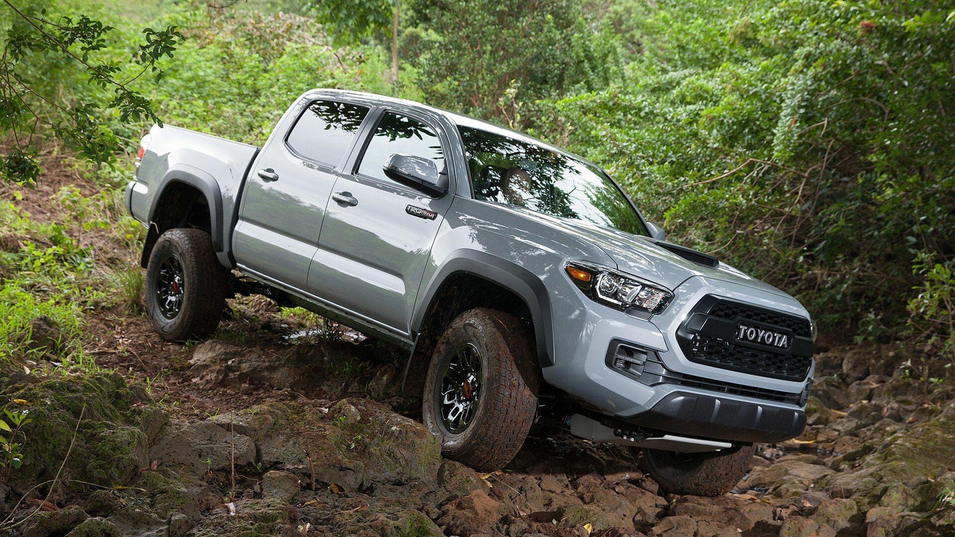 Toyota Tacoma: The TRD Off-Road trim models feature a terrain select mode. 1920x1080 Full HD Background.