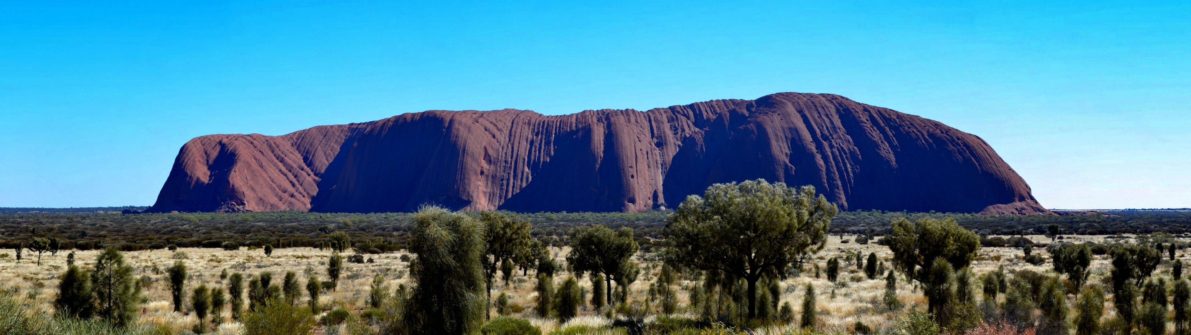 Uluru wallpaper, Captivating image, Mesmerizing beauty, 3840x1080 Dual Screen Desktop