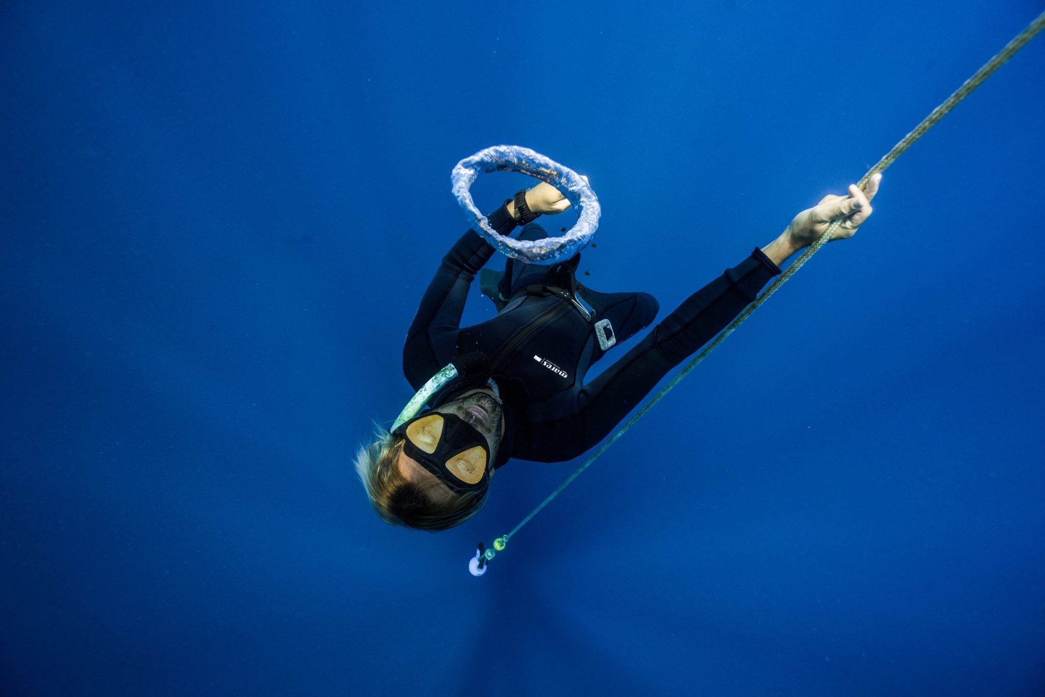 Freediving: A skin diver equipped only with a protective diving mask. 2050x1370 HD Wallpaper.