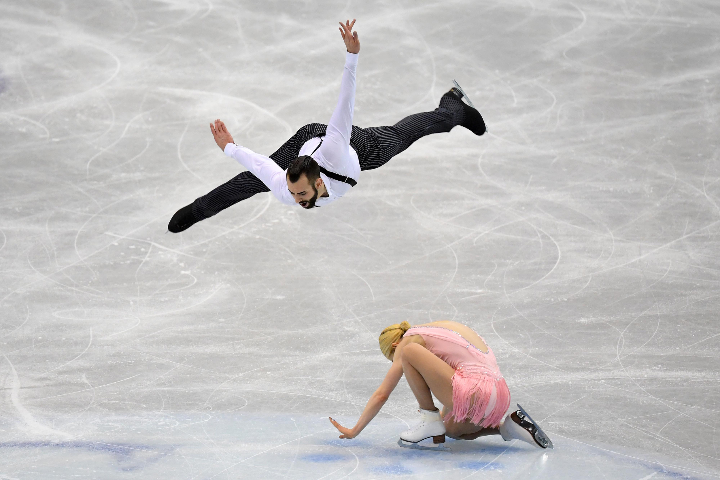 Pair Skating: Non-binary figure skater Timothy LeDuc, Winter Olympian. 2500x1670 HD Background.