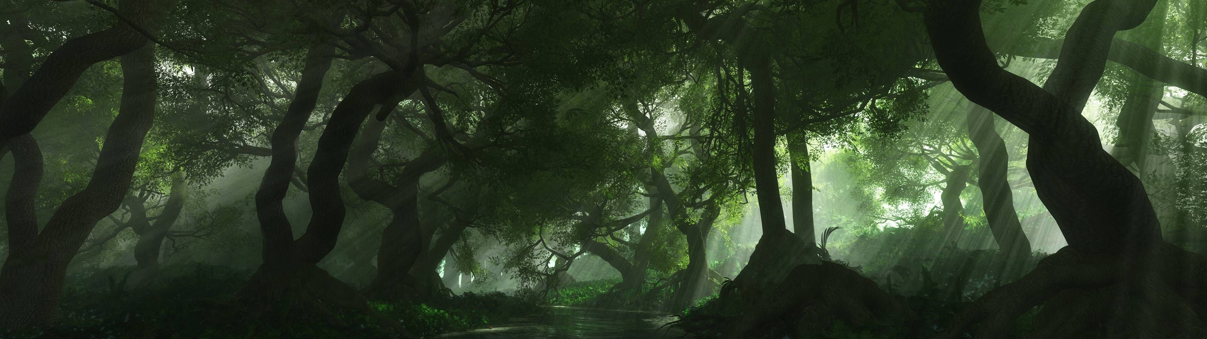 Green Forest: A tree on the side of a green hill, The view of a foggy lake near the peak of the mountain. 3840x1080 Dual Screen Wallpaper.
