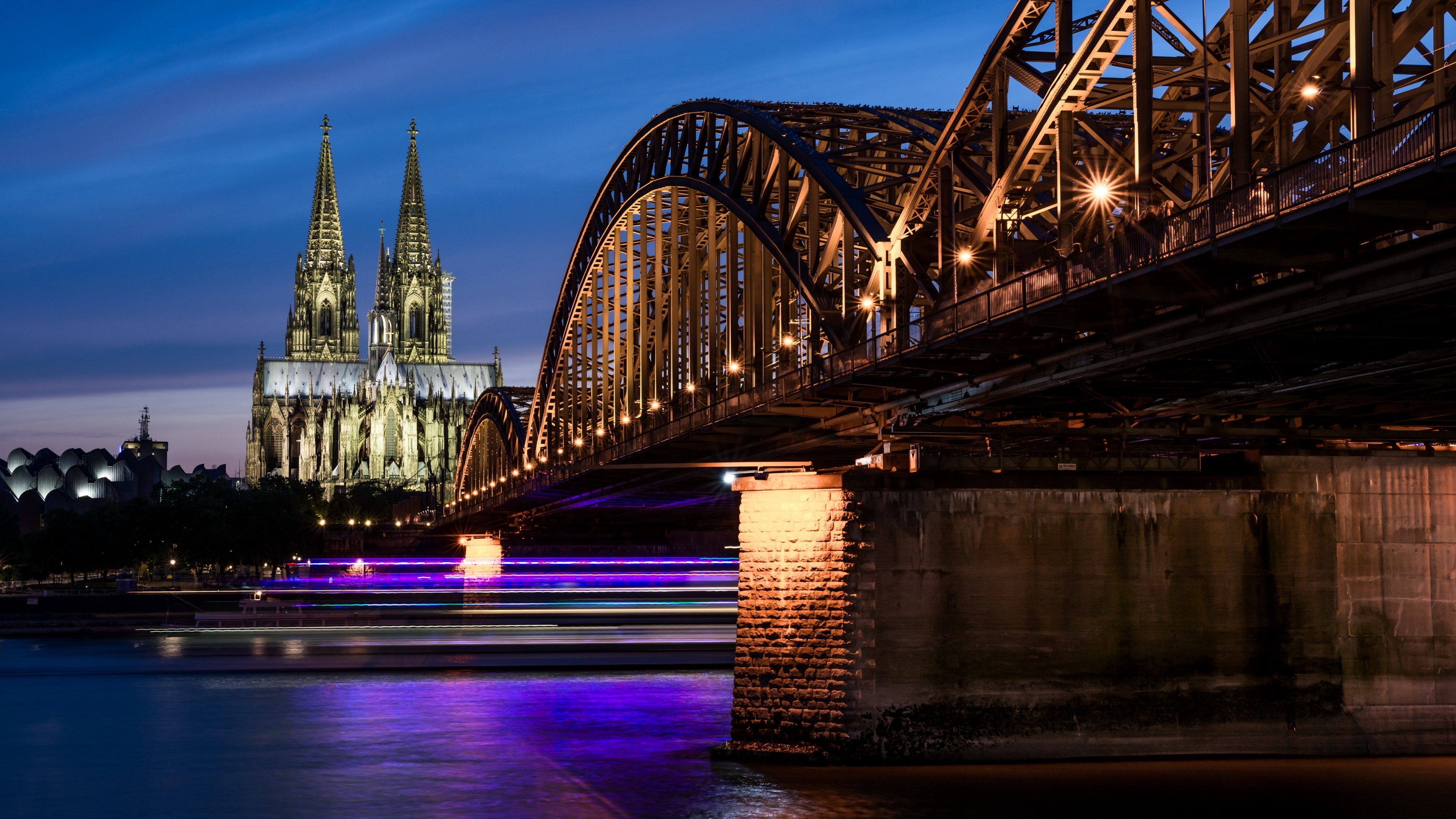 Cathedral: The Hohenzollern Bridge and the Cologne Church of Saint Peter, Germany. 3840x2160 4K Background.