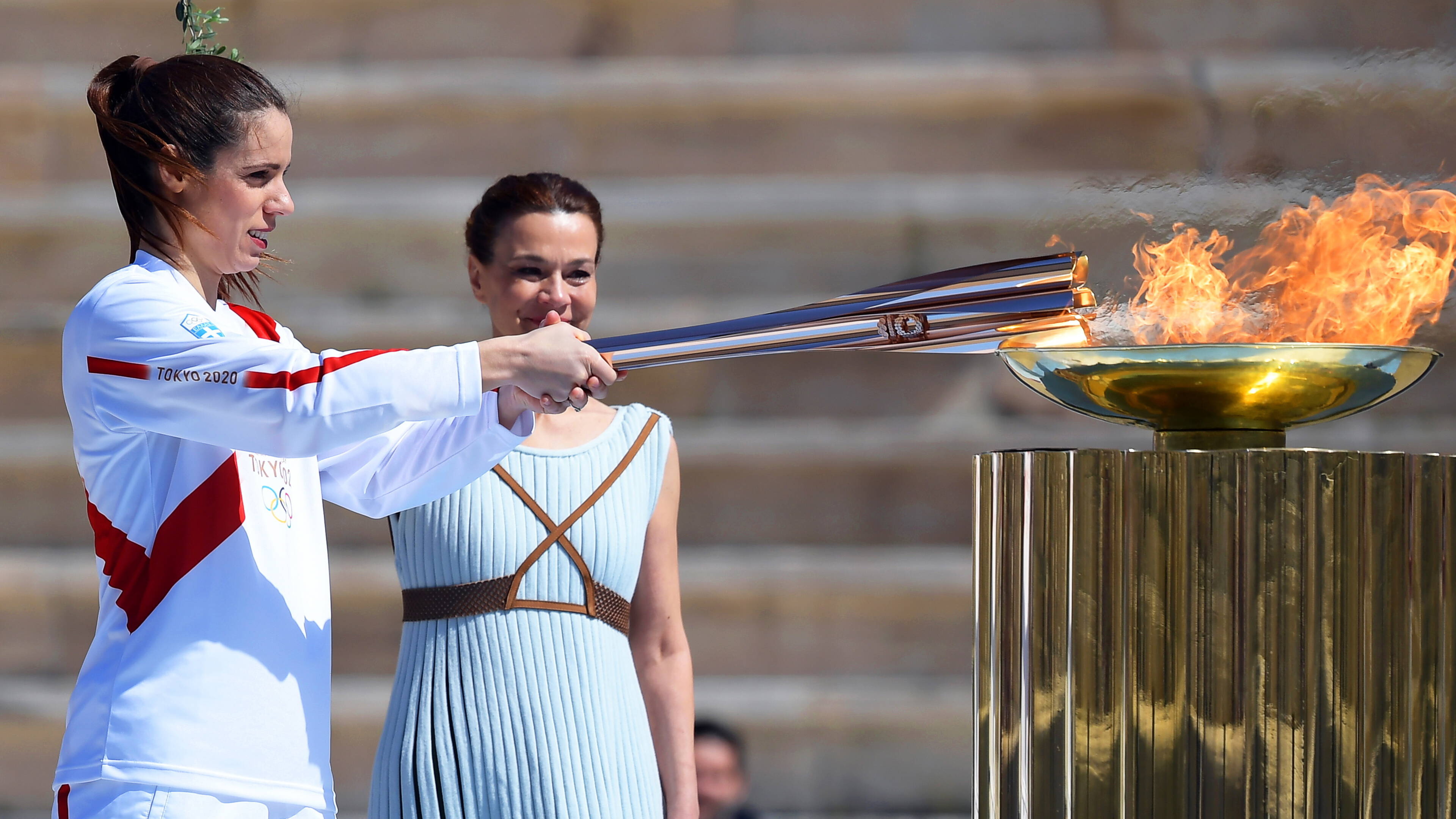 Olympic Flame: Lighting of the Olympic torch, Flame Handover Ceremony, Tokyo 2020 Summer Olympics, Greece. 3840x2160 4K Background.