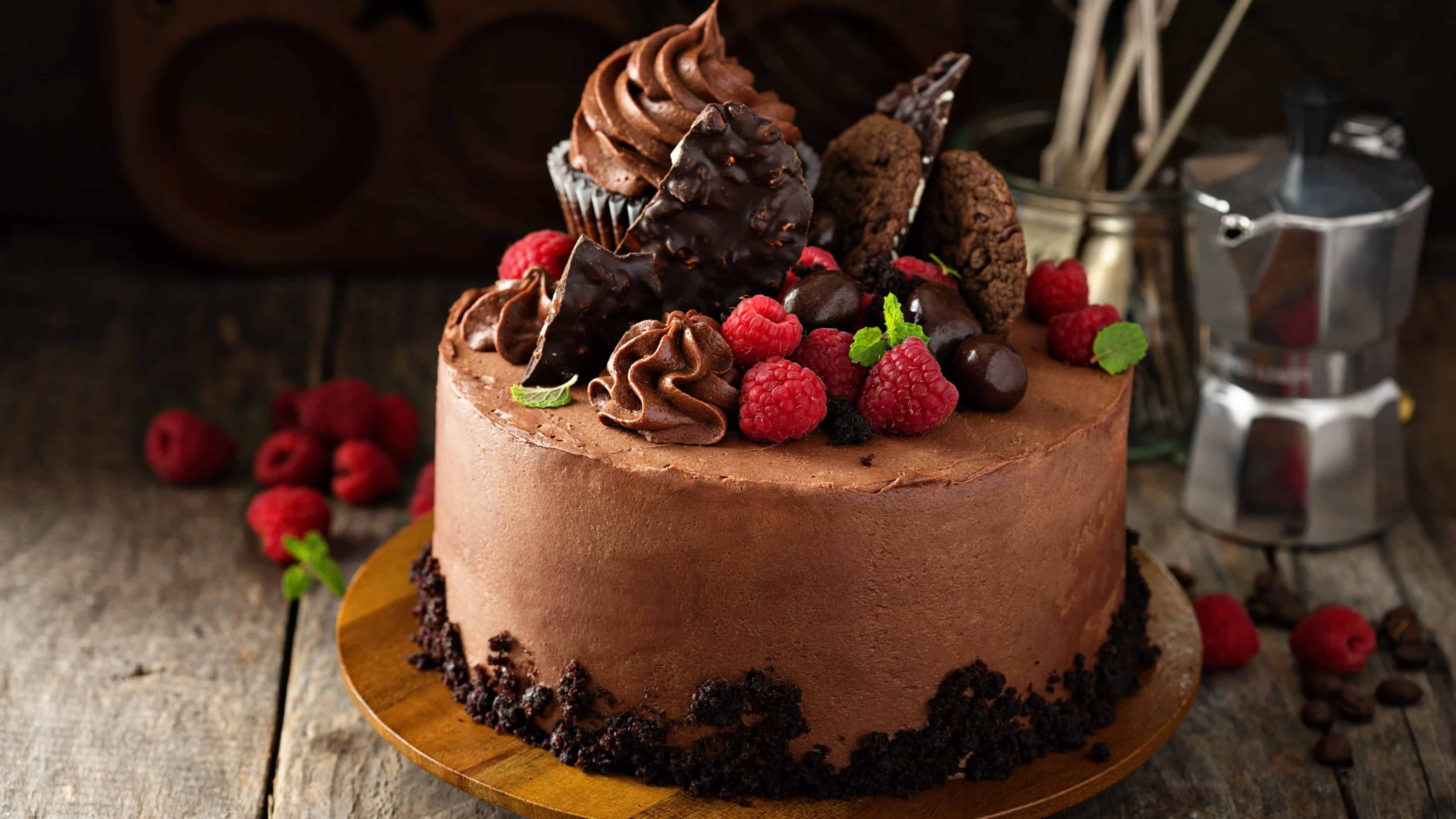 Cake: Chocolate, Raspberry, A sweetened bread, often rich or delicate. 3840x2160 4K Background.