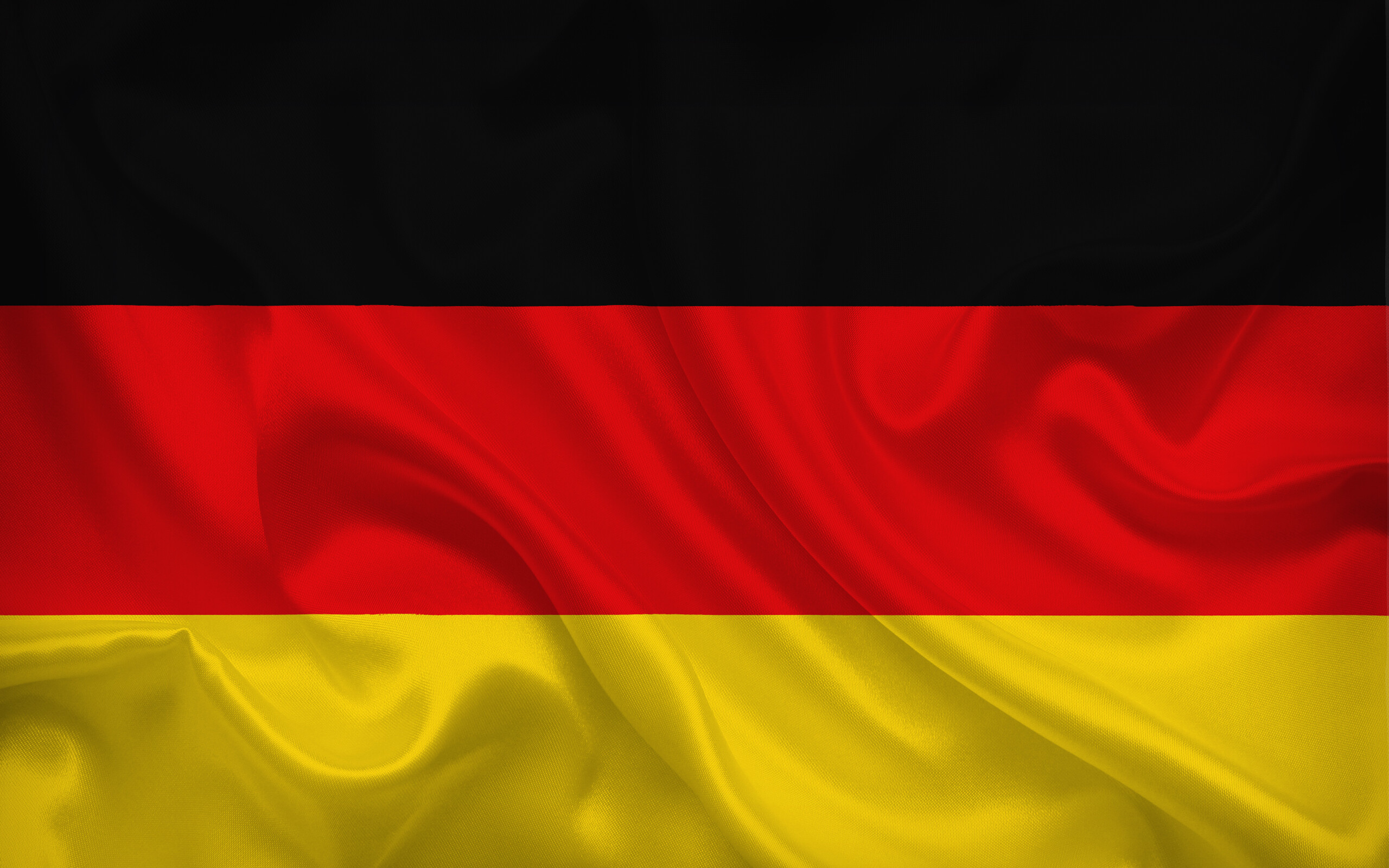 Flag of Germany: A country in Europe that is situated between the Baltic and North seas to the north, and the Alps to the south. 2560x1600 HD Wallpaper.