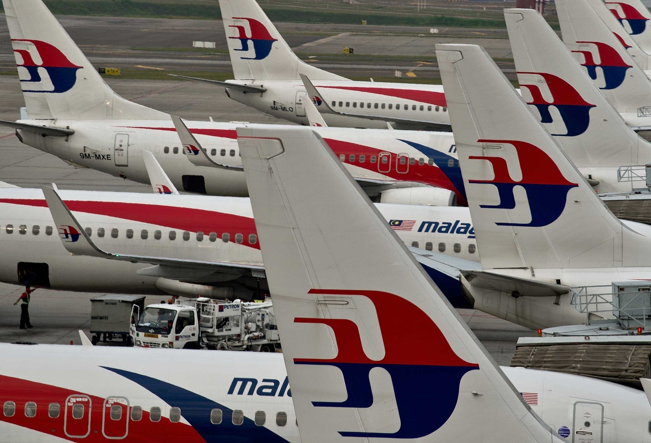 Malaysia Airlines slammed, Insensitive tweet promotion, Time, 2560x1750 HD Desktop