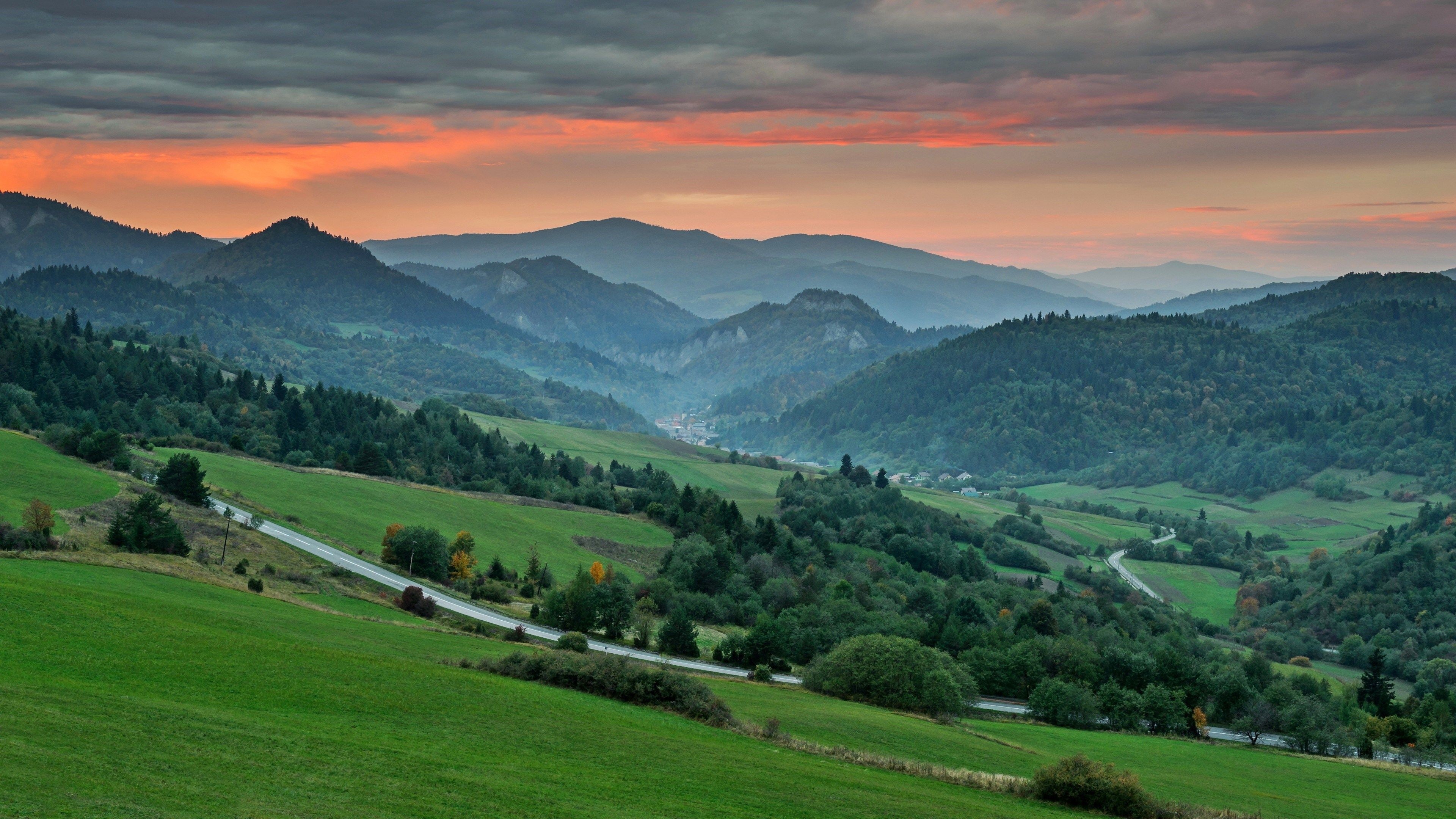 Landscape: A road in the mountain valley in Switzerland, European nature, Sunset. 3840x2160 4K Background.