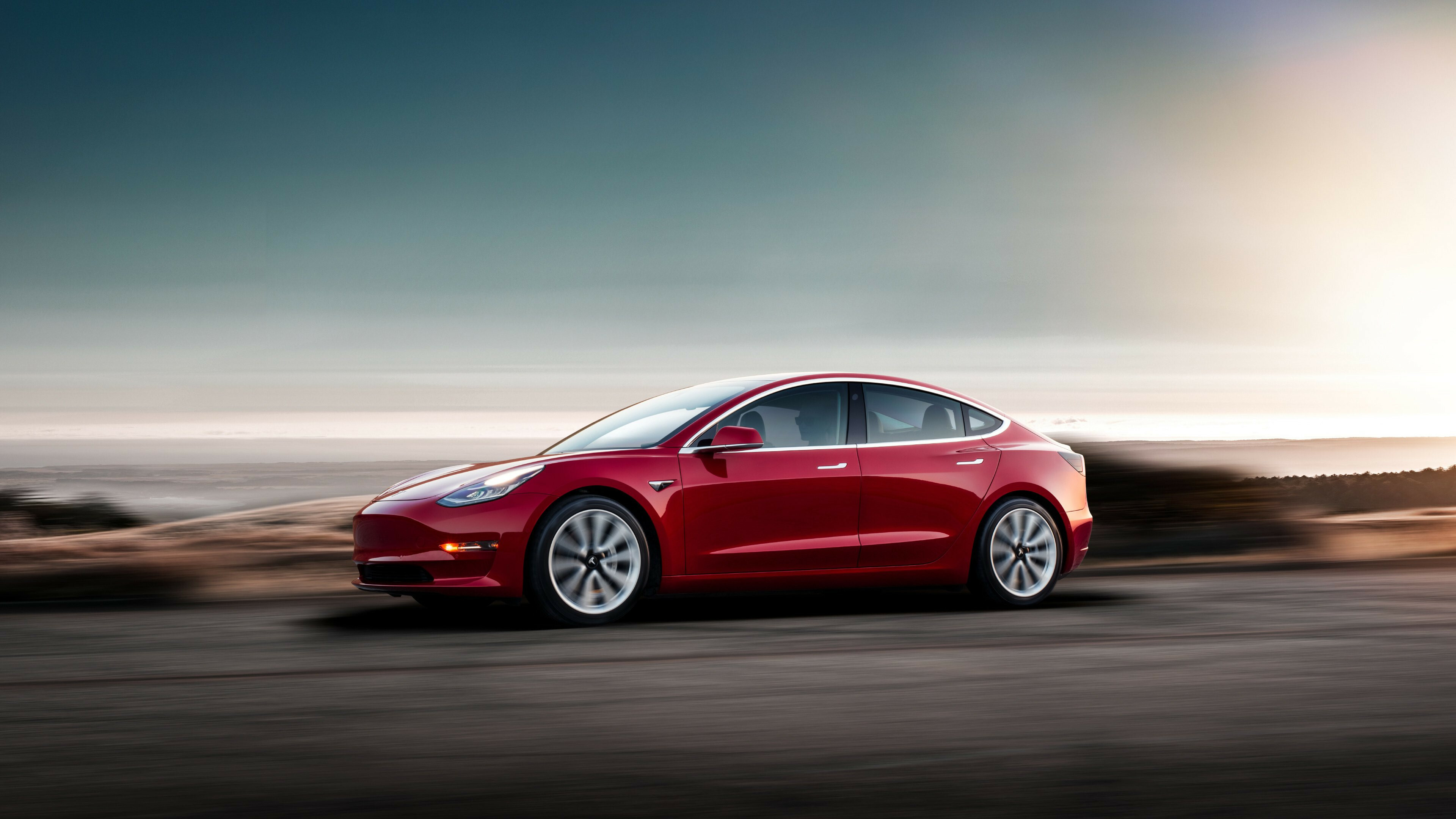 Tesla Model S: Luxury EV, A battery-powered liftback car serving as the flagship model. 3840x2160 4K Background.