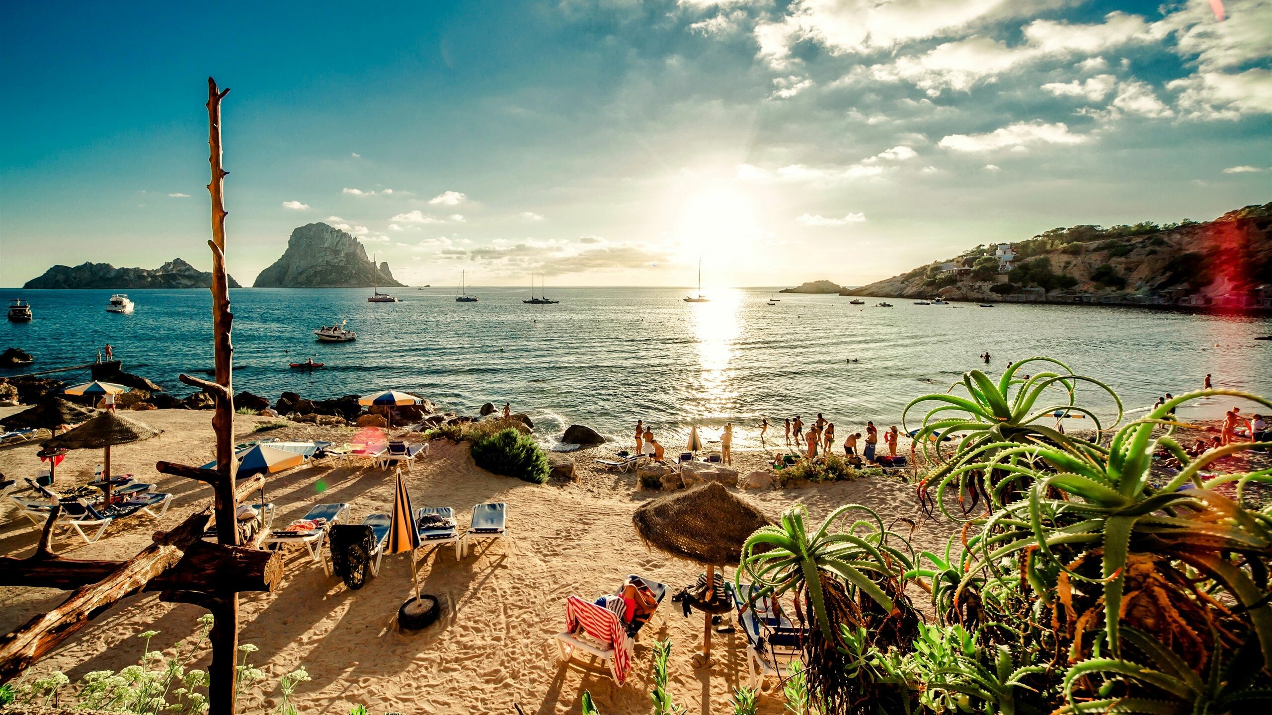 Ibiza: Garnered the reputation as the "Party Capital of the world", A Spanish island. 2560x1440 HD Background.