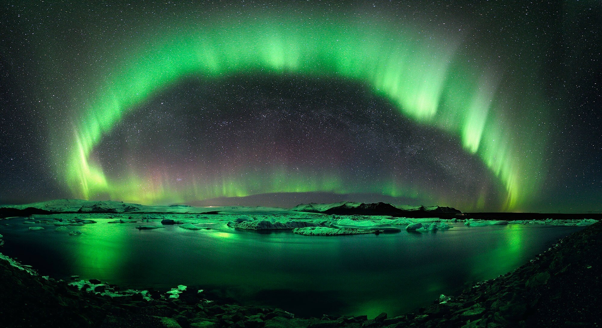 Aurora Borealis: A spectacular natural phenomenon, Night sky. 2000x1100 HD Wallpaper.