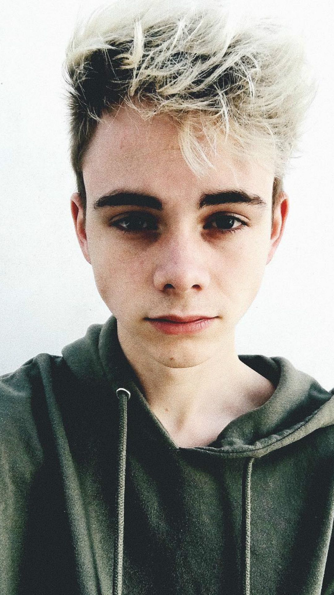 Corbyn Besson's charisma, Striking wallpapers, Captivating allure, Fan's ultimate fave, 1080x1920 Full HD Phone