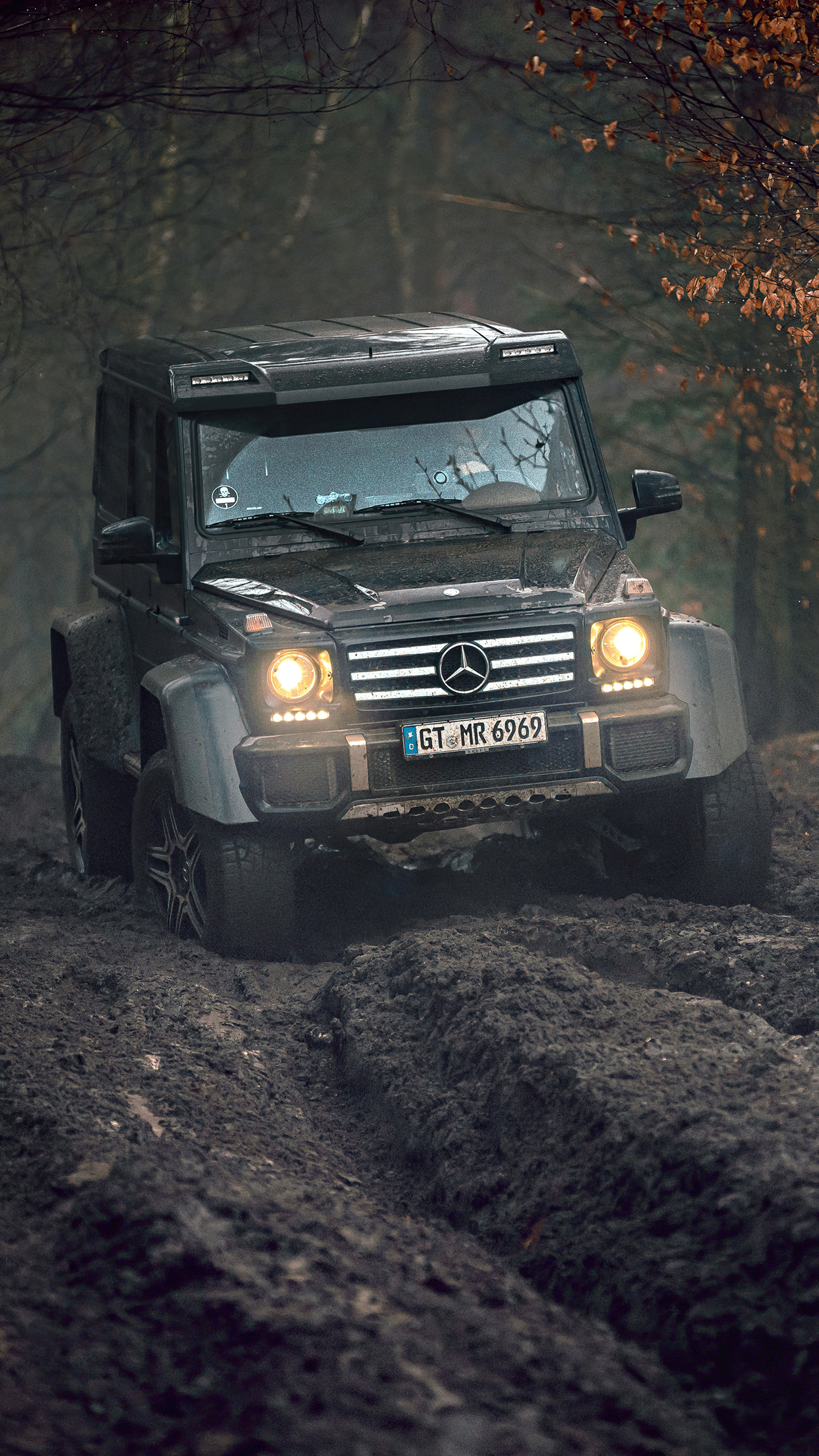 Off-road Driving: Mercedes G500 4x4, The exceptional ride height, Large-profile tires. 2160x3840 4K Background.