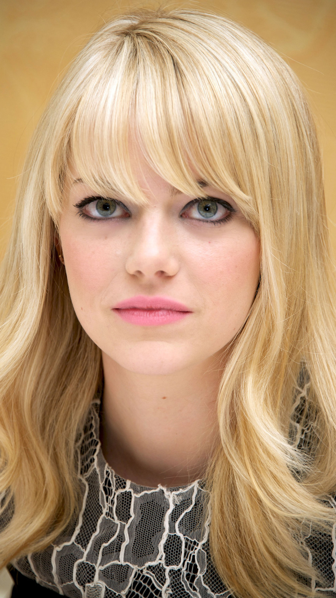 Emma Stone movies, Mobile wallpapers, High-resolution images, Celebrity charm, 1080x1920 Full HD Phone