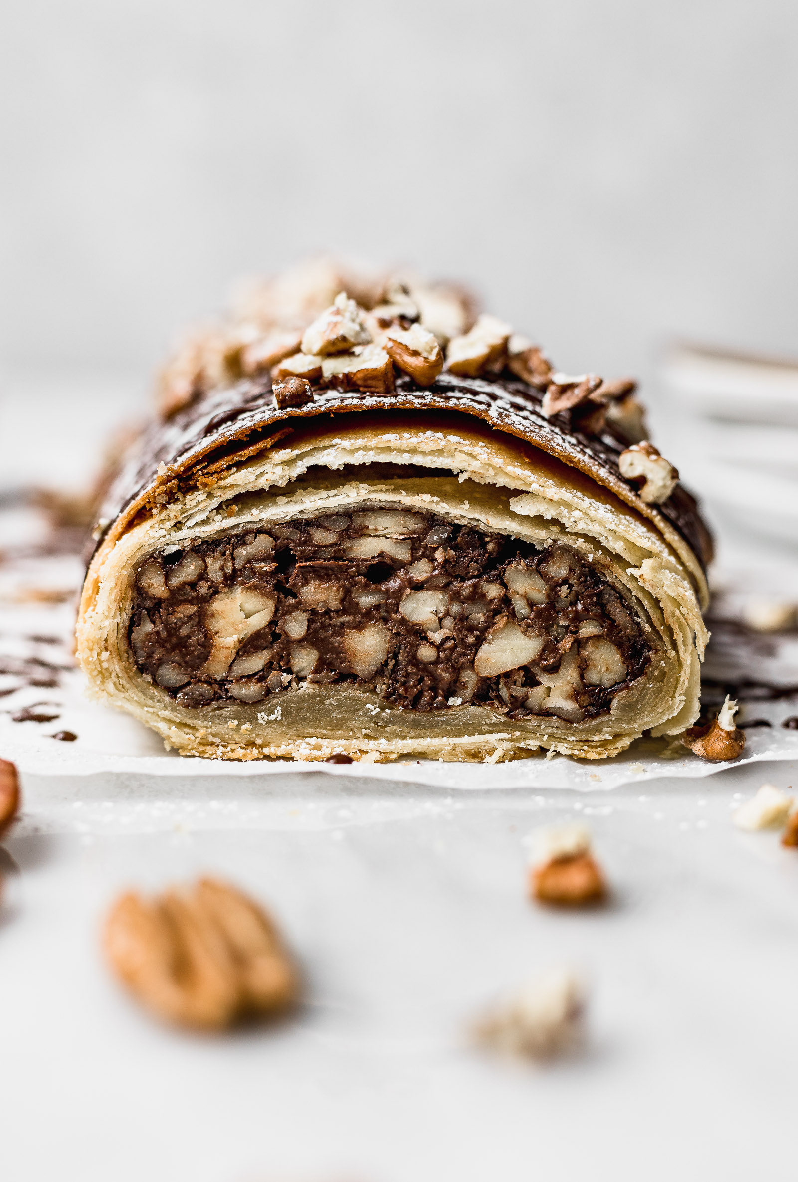 Strudel: Pecan chocolate, Sweet layered pastry with a filling inside. 1600x2370 HD Background.